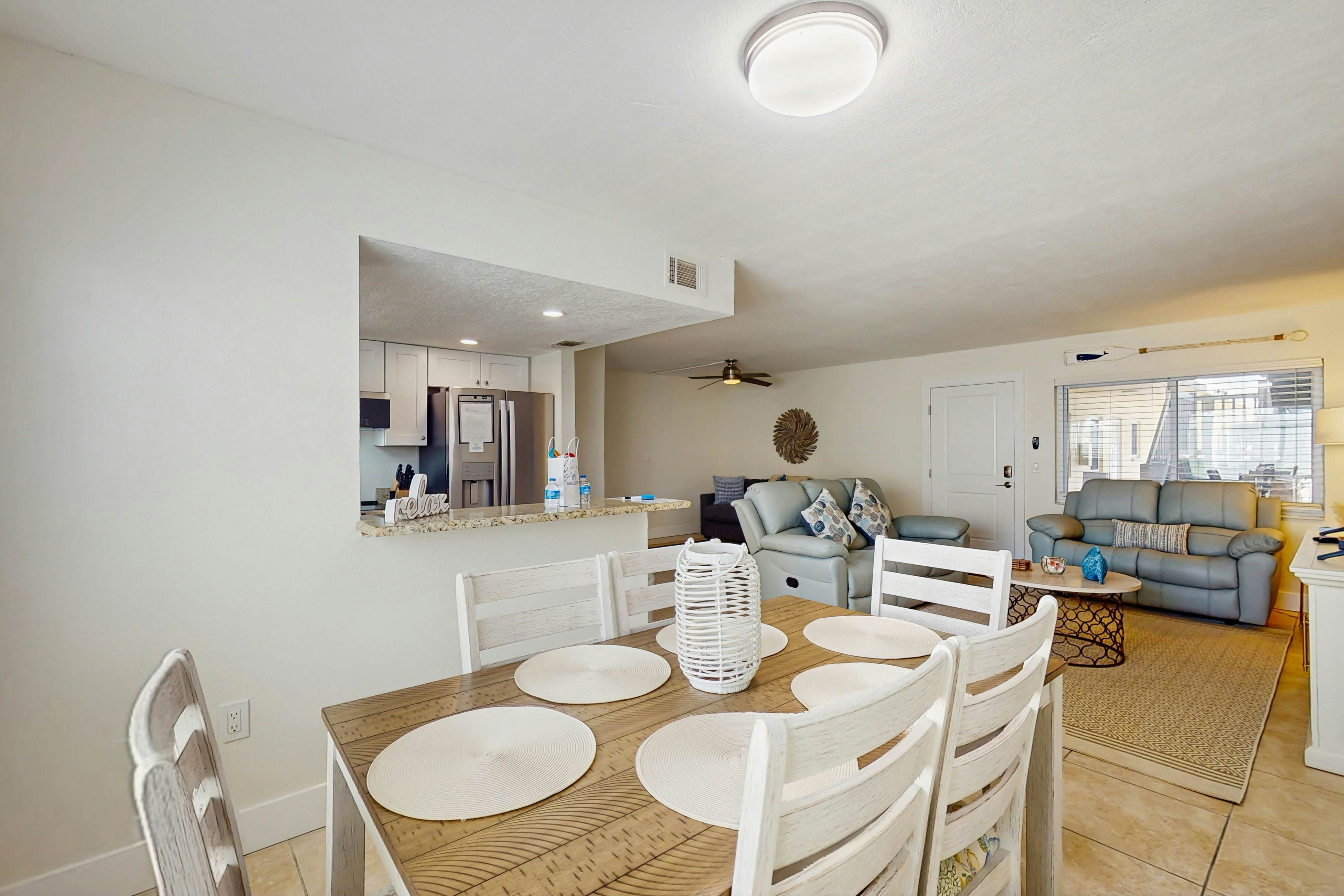 Ground-floor getaway with a heated pool & central AC - walk to the beach