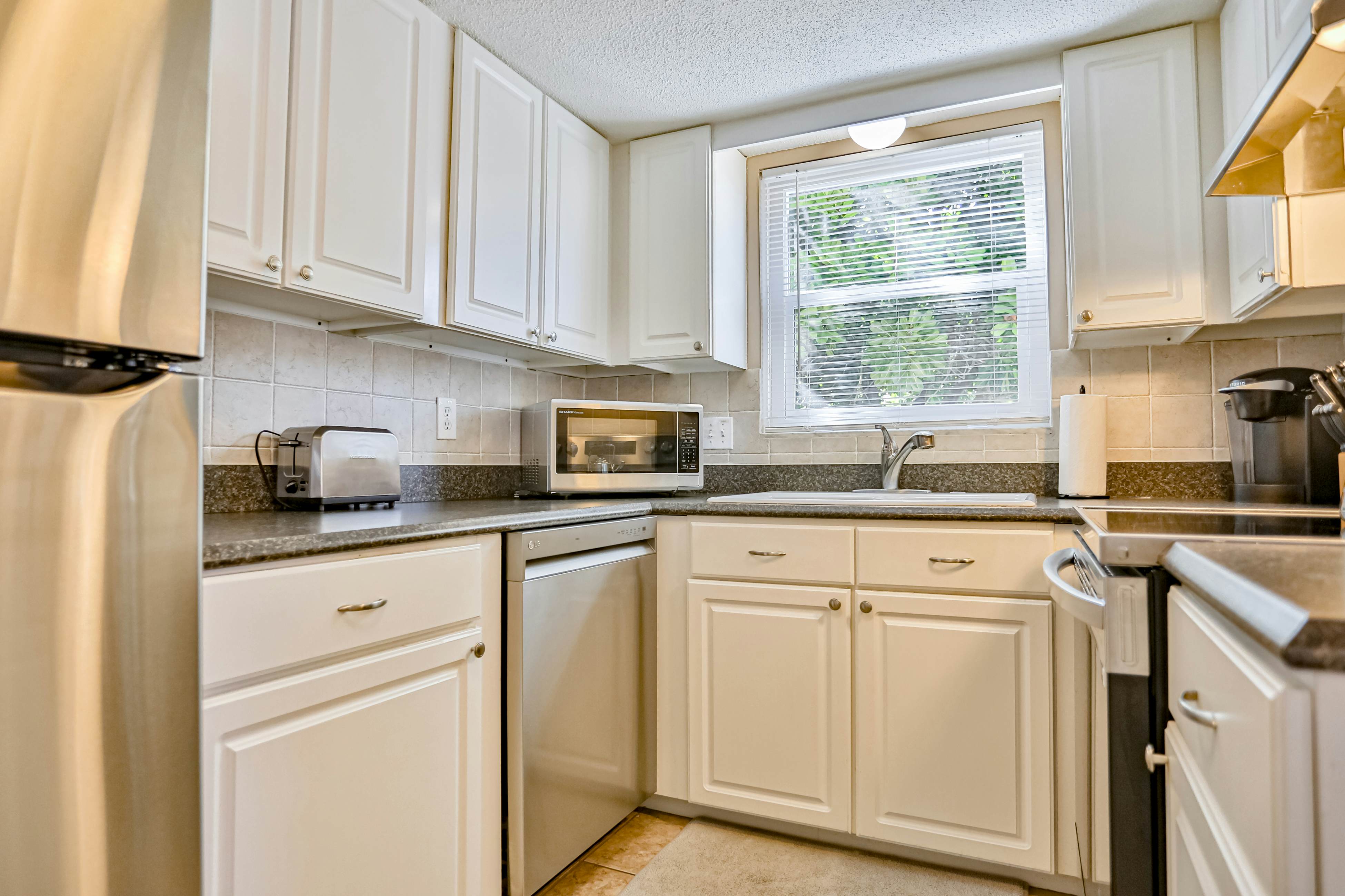 Quiet Waves 20 Condo with Pool | Steps to Dining, Shopping & St. Pete Beach