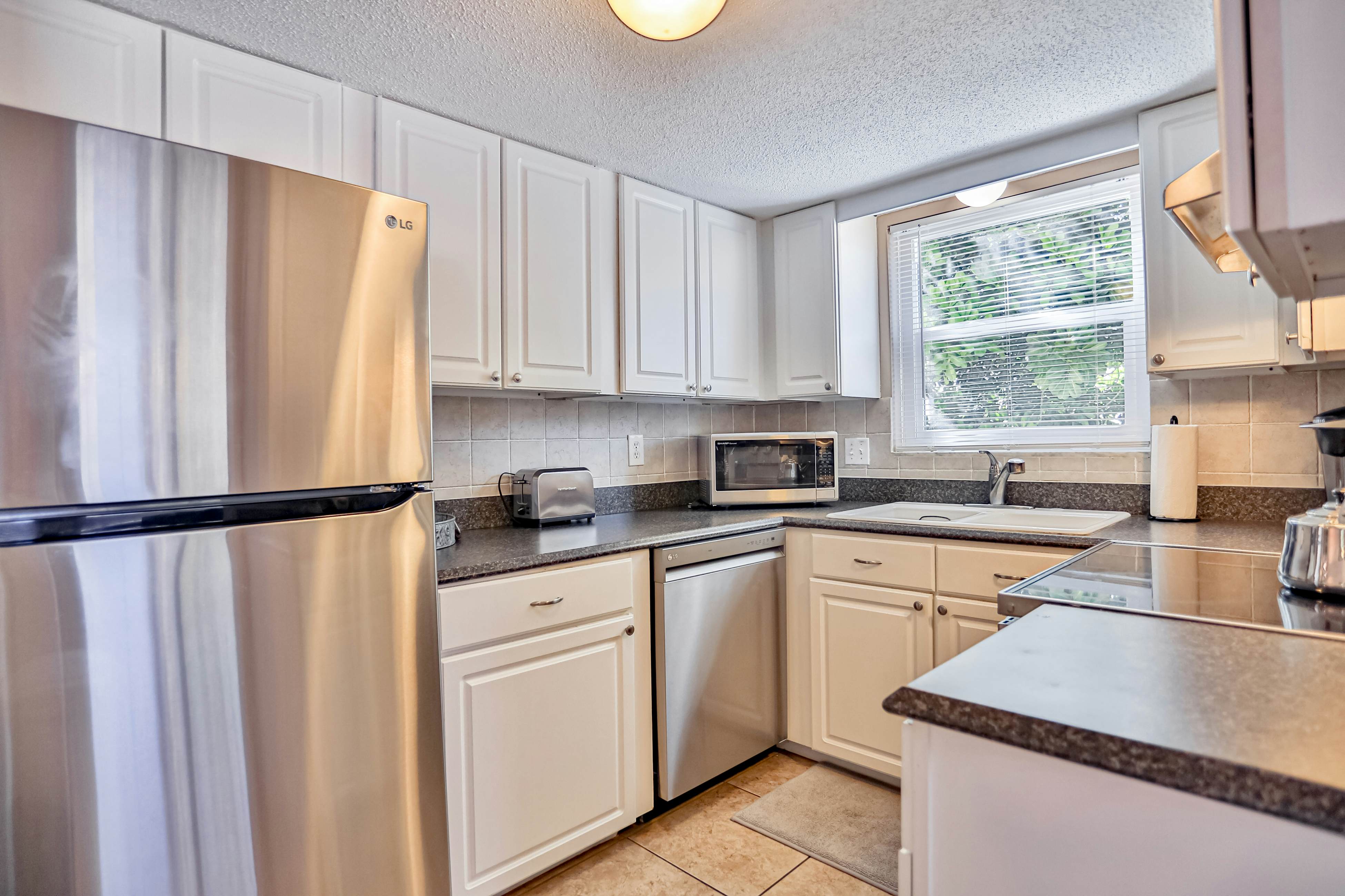 Quiet Waves 20 Condo with Pool | Steps to Dining, Shopping & St. Pete Beach