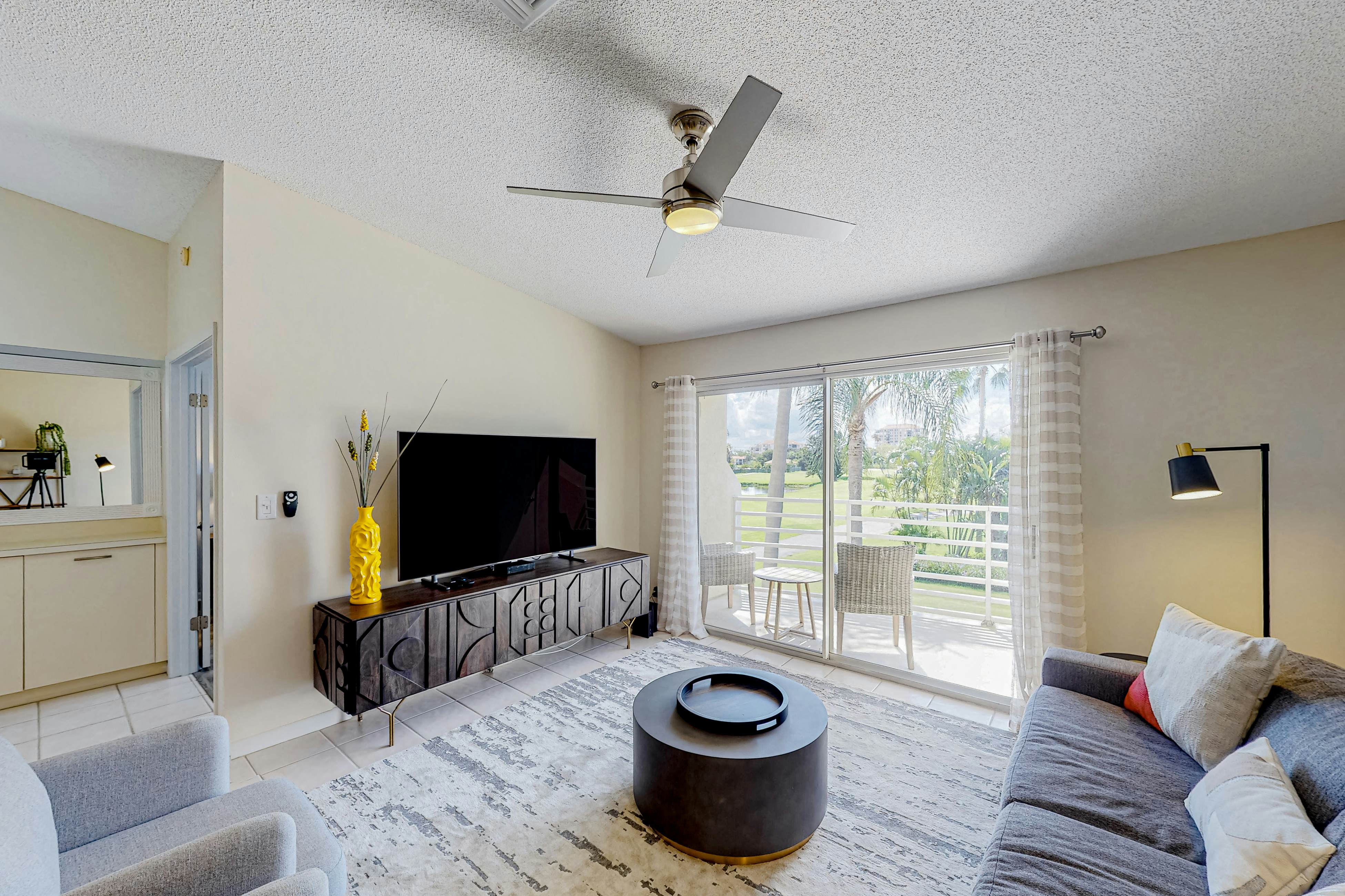 2nd-Floor Condo Overlooking Country Club Greens w/Free WiFi, AC, and Shared Pool