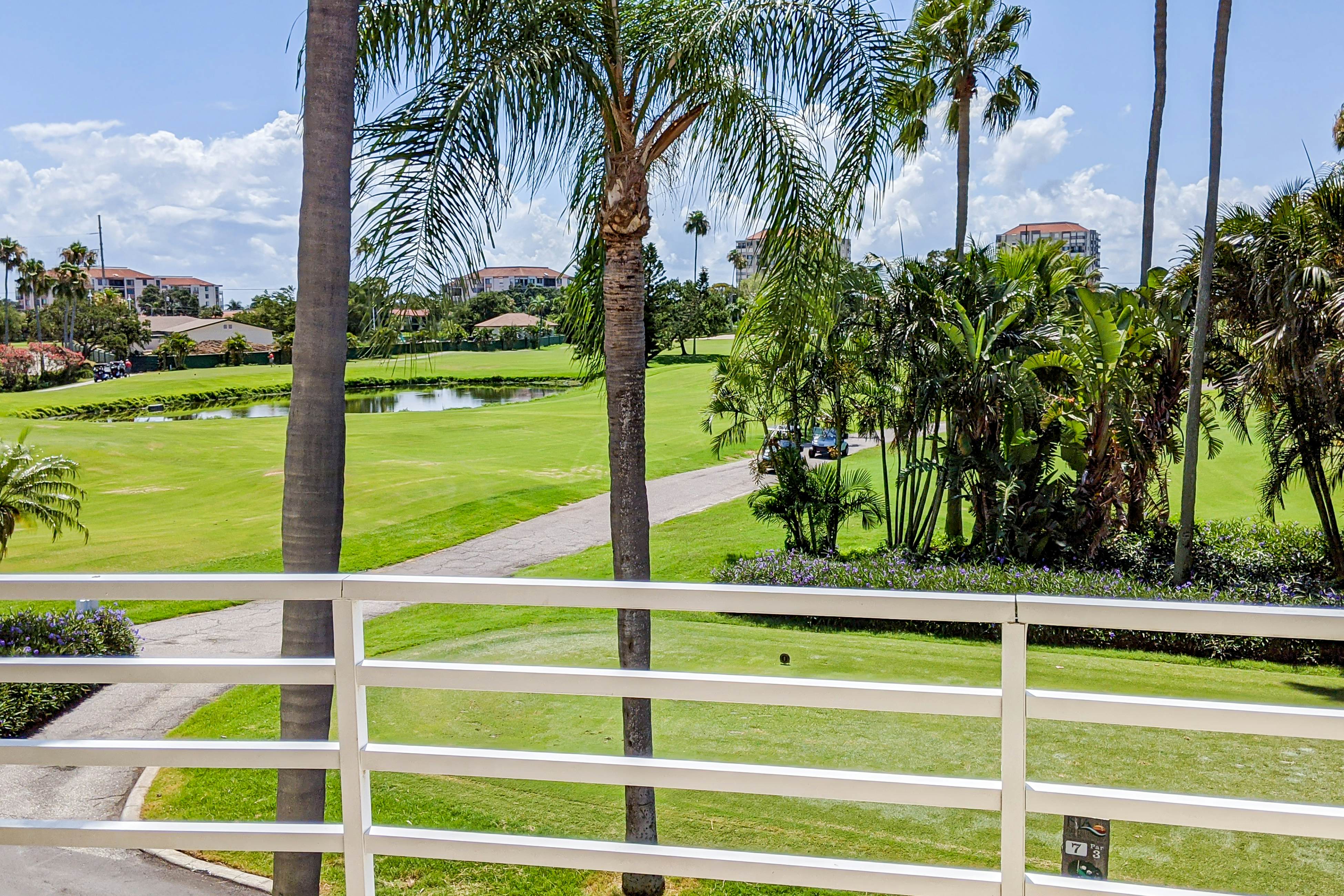 2nd-Floor Condo Overlooking Country Club Greens w/Free WiFi, AC, and Shared Pool