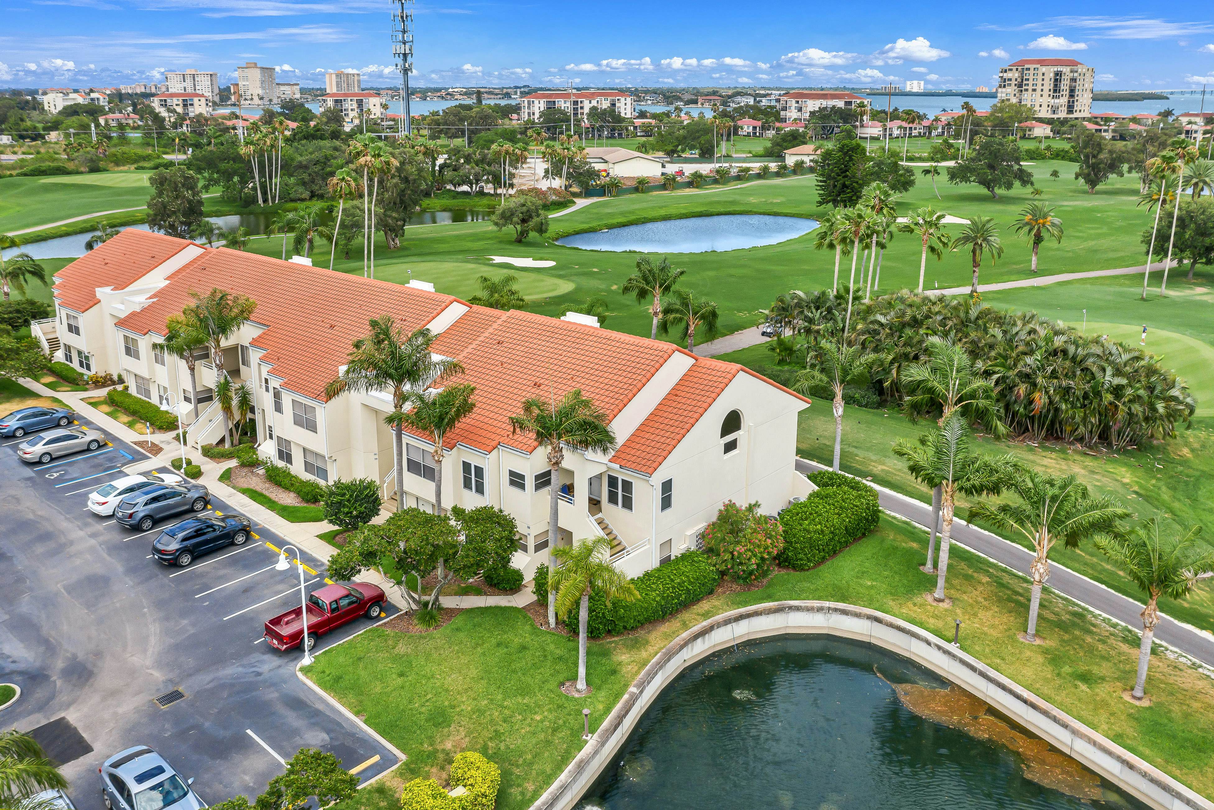 2nd-Floor Condo Overlooking Country Club Greens w/Free WiFi, AC, and Shared Pool