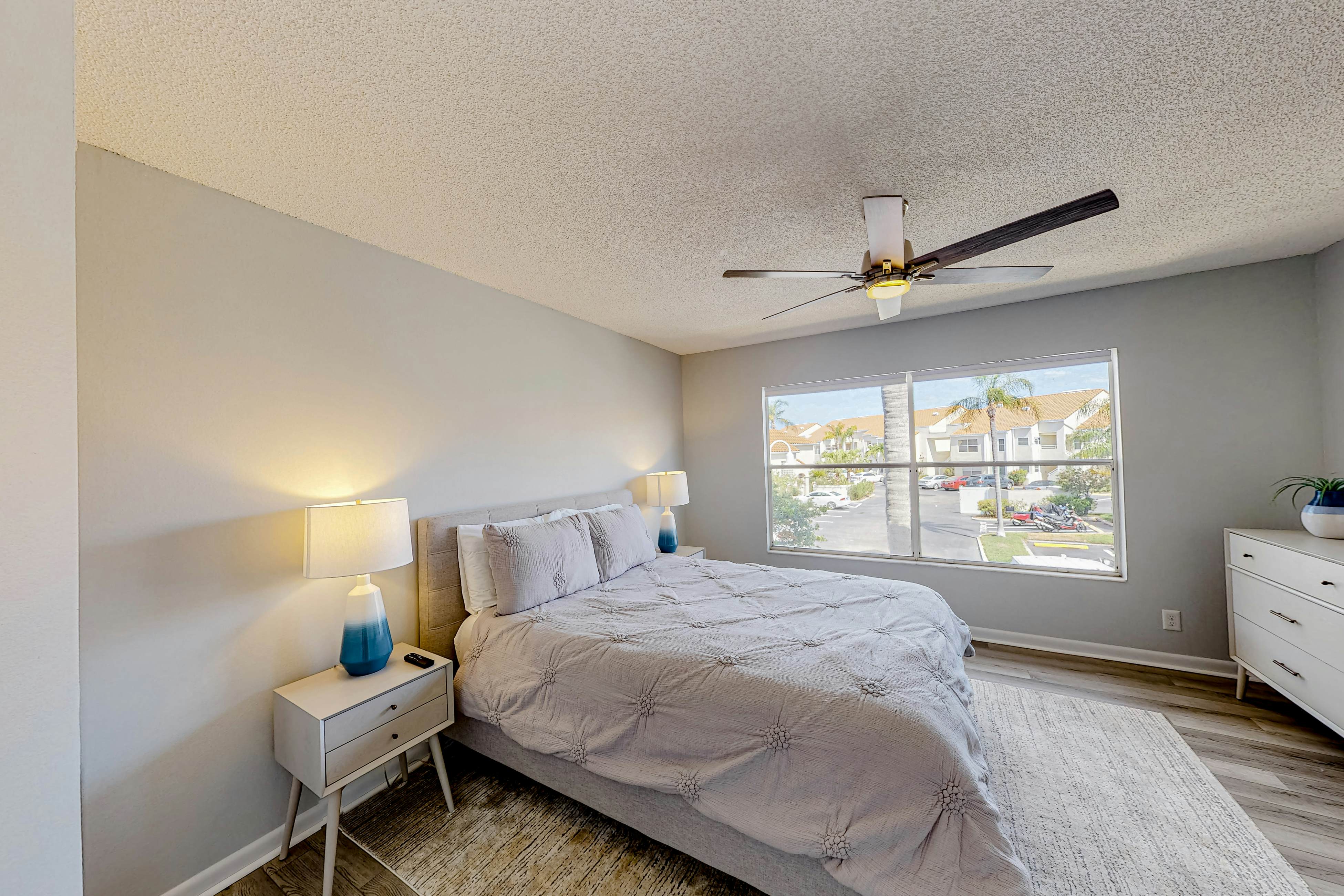 2nd-Floor Condo Overlooking Country Club Greens w/Free WiFi, AC, and Shared Pool