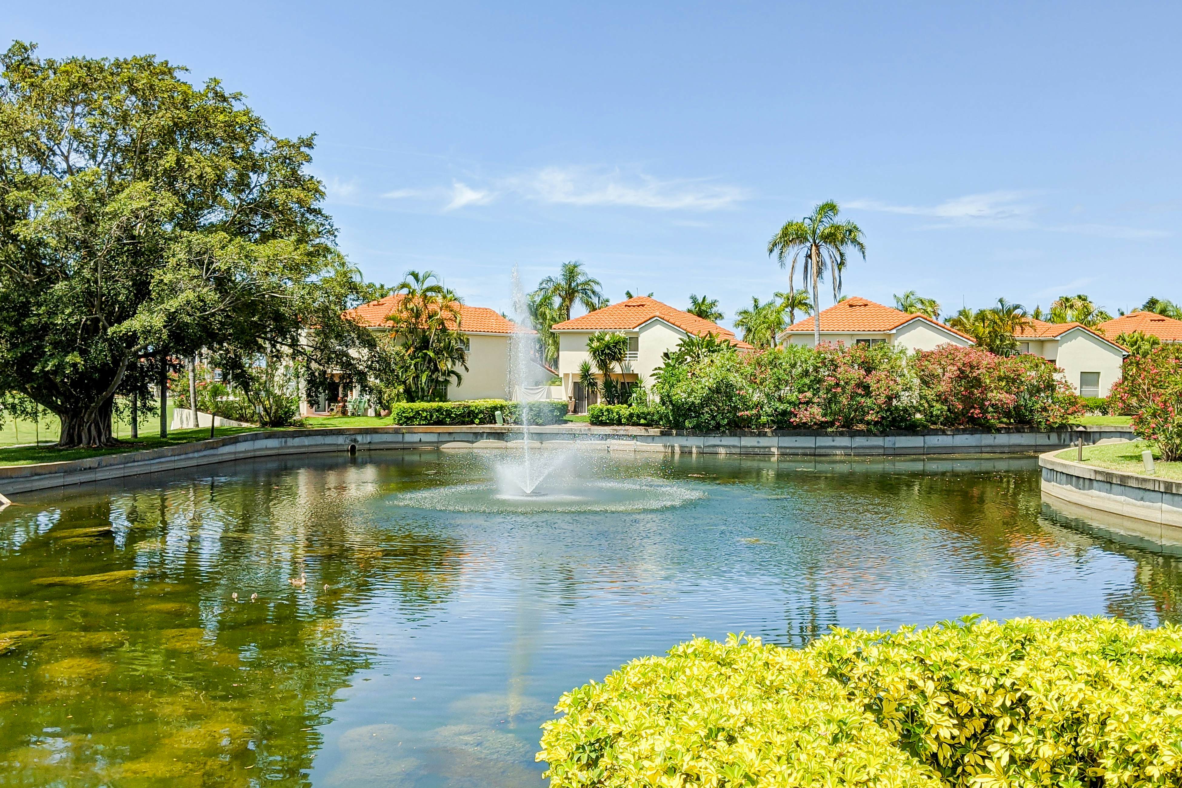 2nd-Floor Condo Overlooking Country Club Greens w/Free WiFi, AC, and Shared Pool