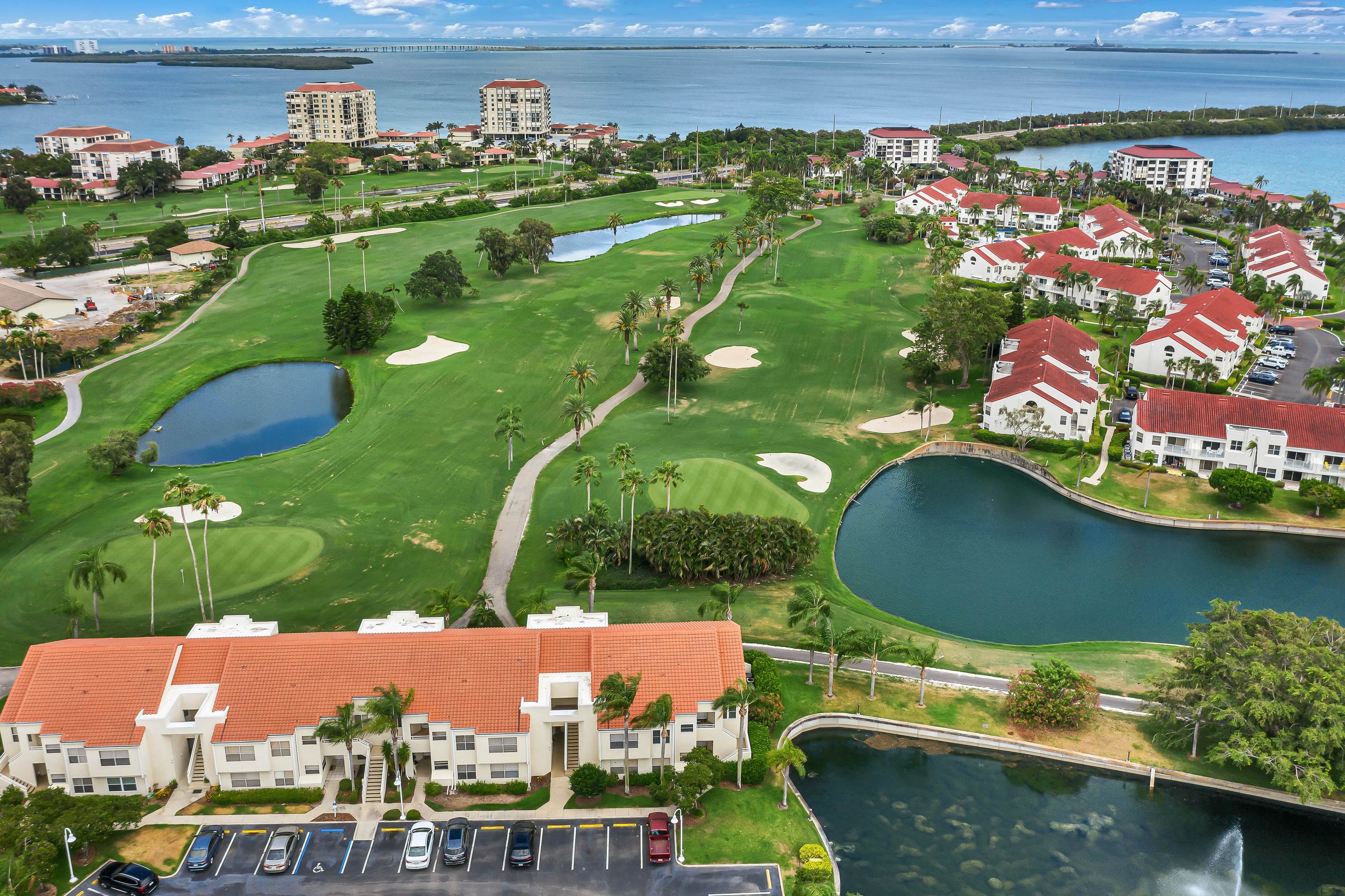 2nd-Floor Condo Overlooking Country Club Greens w/Free WiFi, AC, and Shared Pool