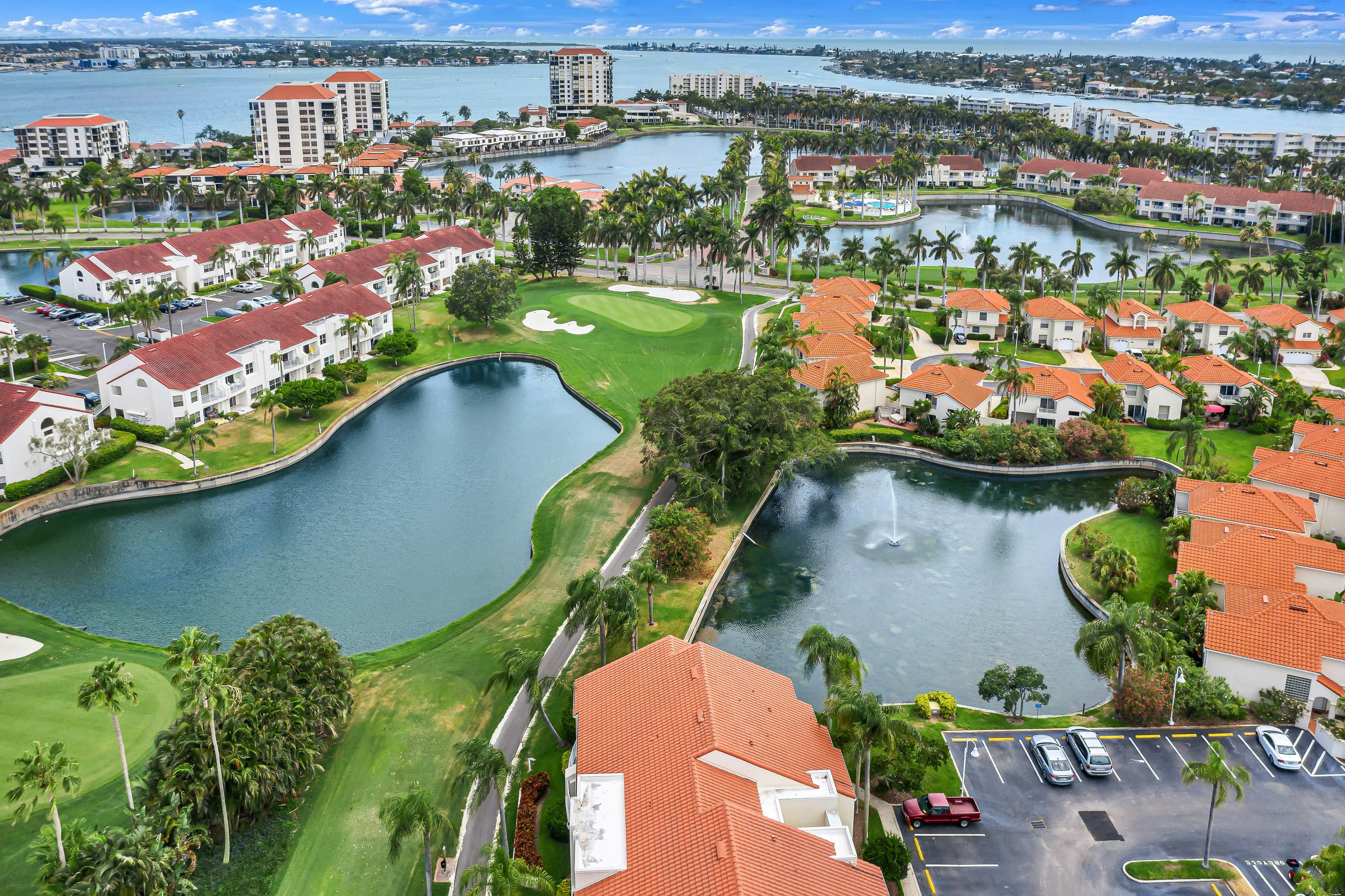 2nd-Floor Condo Overlooking Country Club Greens w/Free WiFi, AC, and Shared Pool