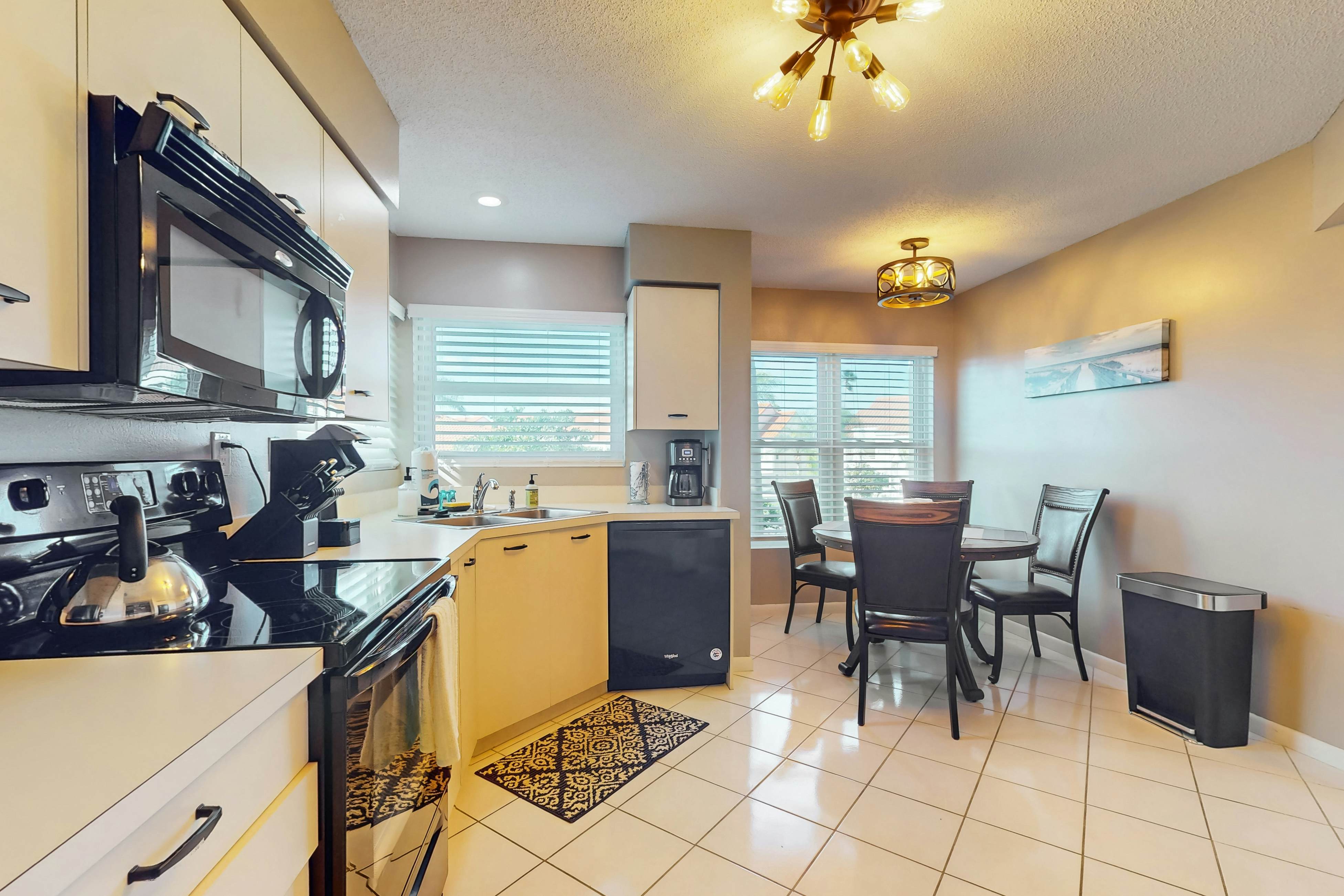 Golf Course View front condo with pool and private beach access snowbird friendly