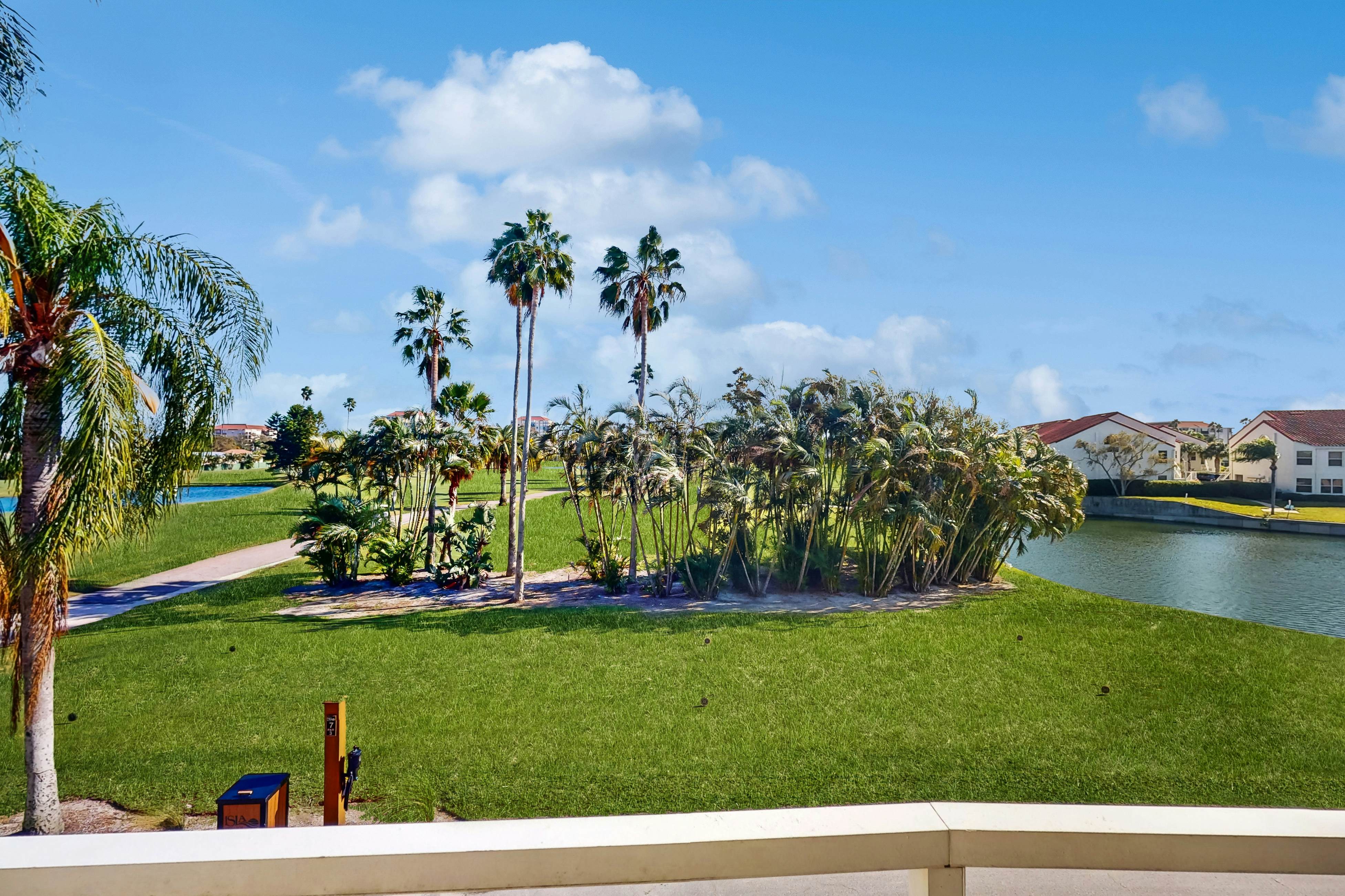 Golf Course View front condo with pool and private beach access snowbird friendly
