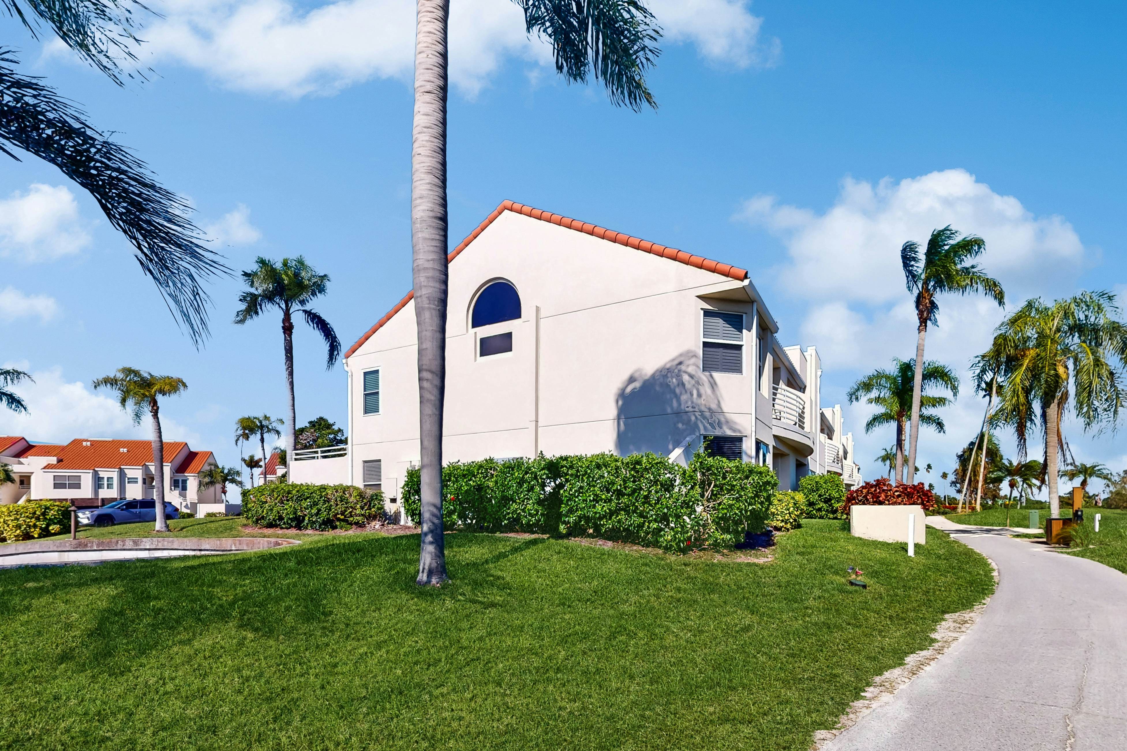 Golf Course View front condo with pool and private beach access snowbird friendly