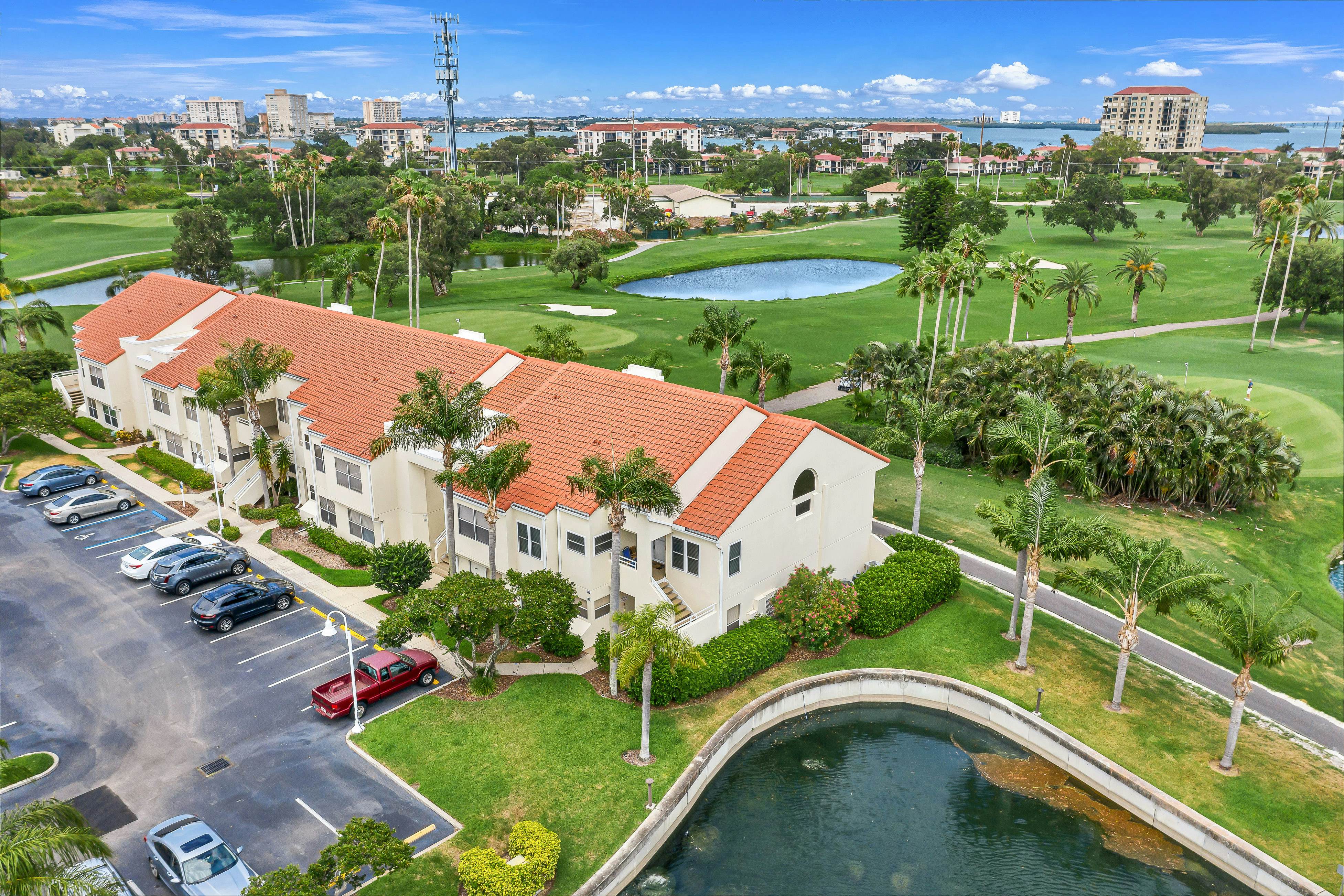 Golf Course View front condo with pool and private beach access snowbird friendly