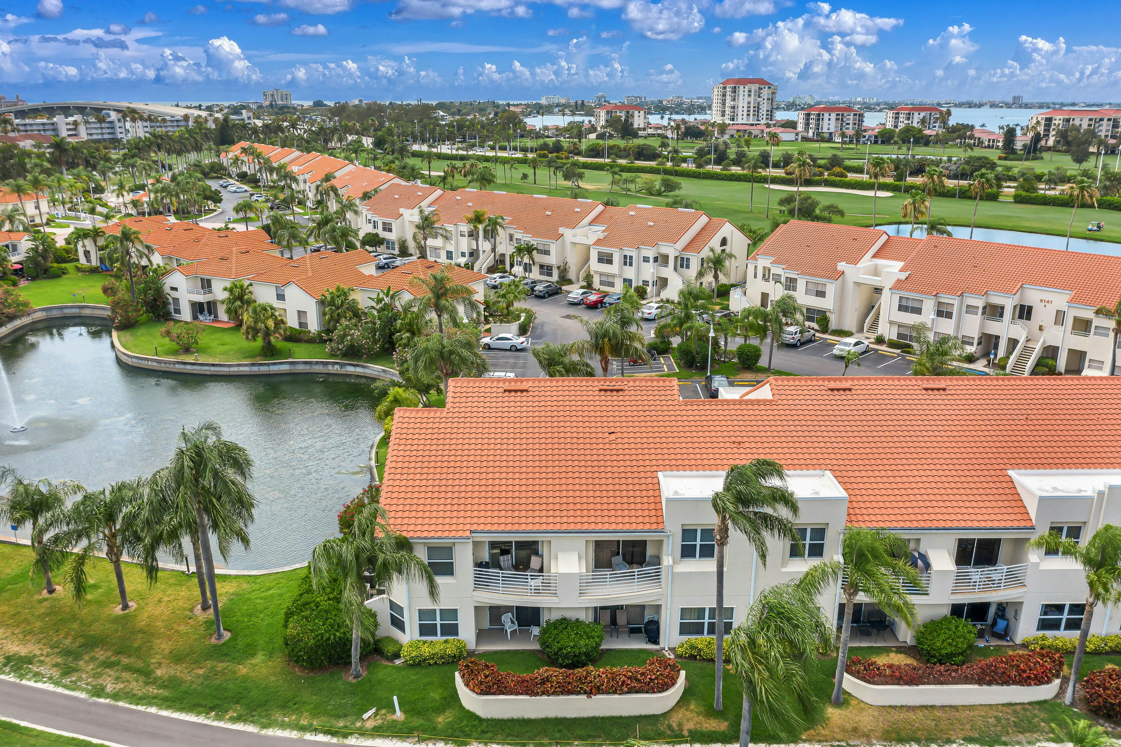 Golf Course View front condo with pool and private beach access snowbird friendly
