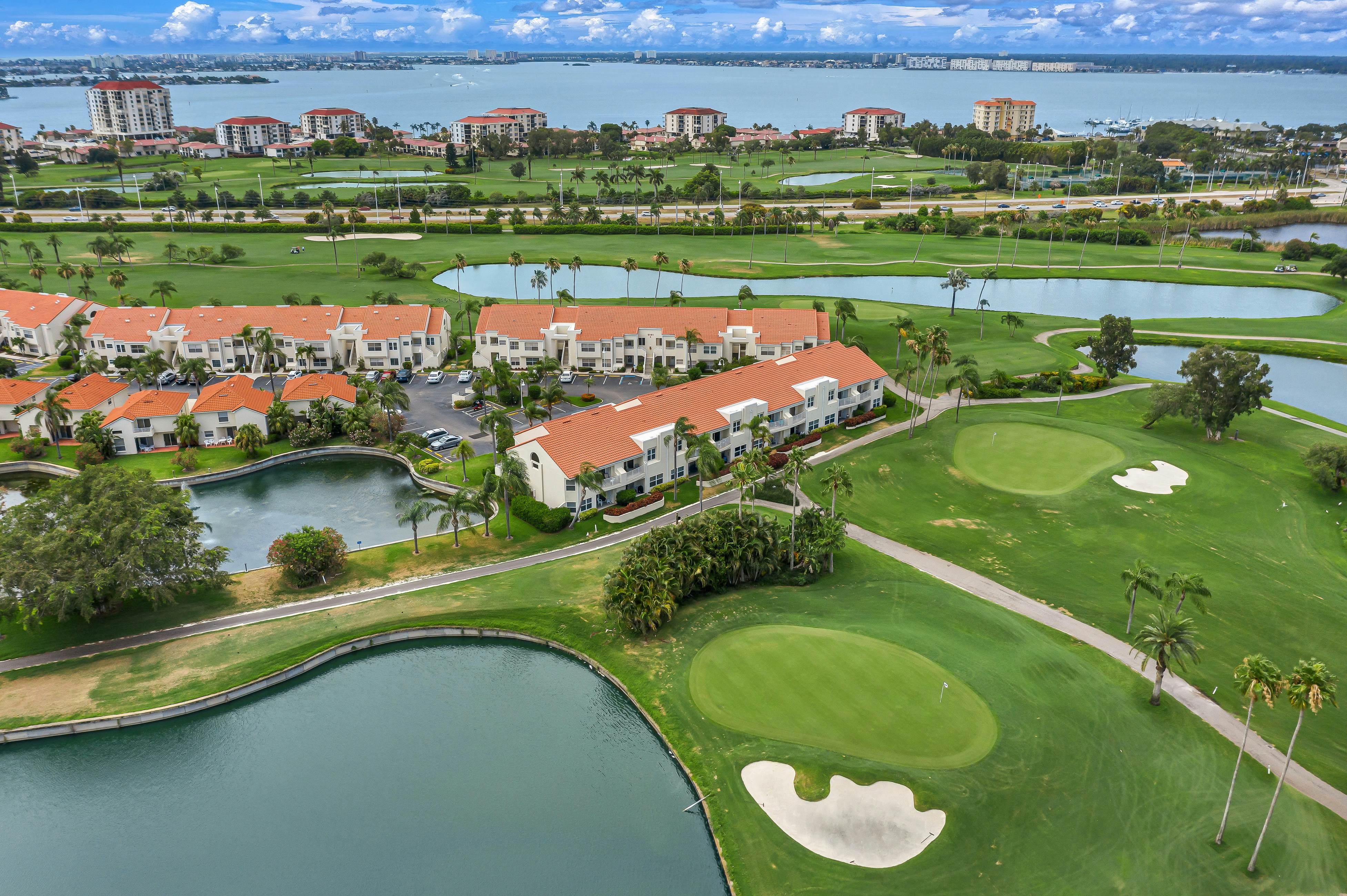 Golf Course View front condo with pool and private beach access snowbird friendly