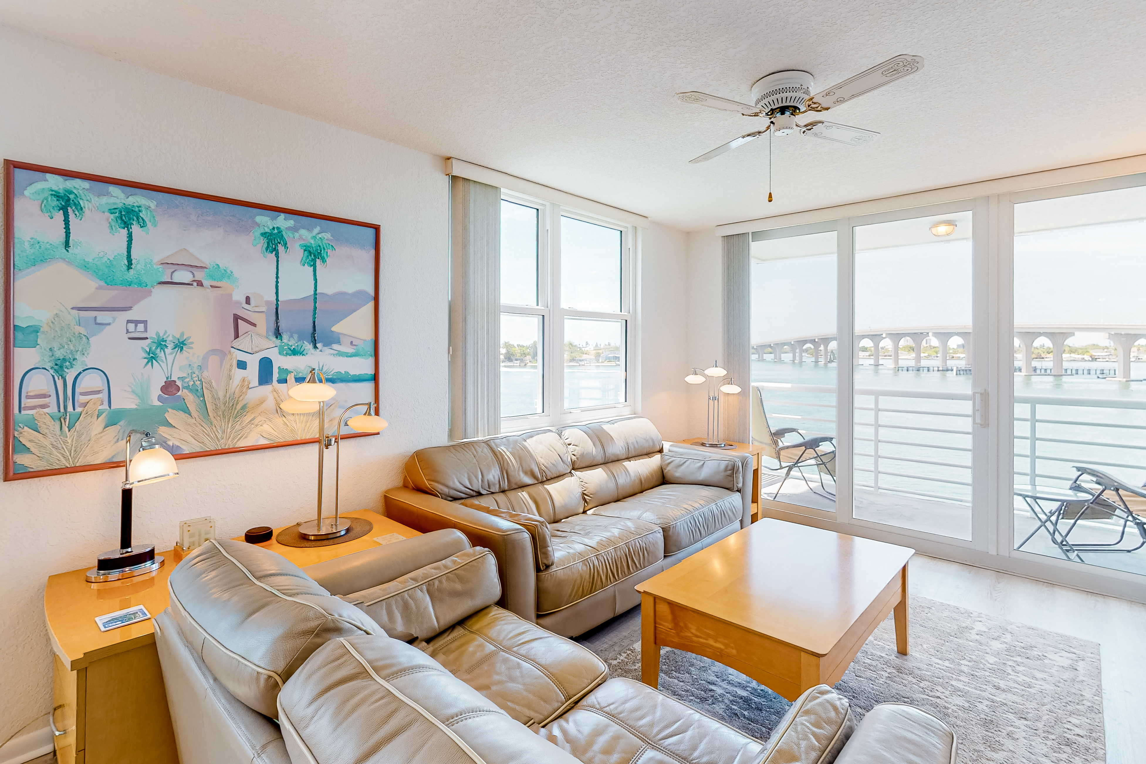 Water view condo with private beach pool and hot tub snowbird friendly