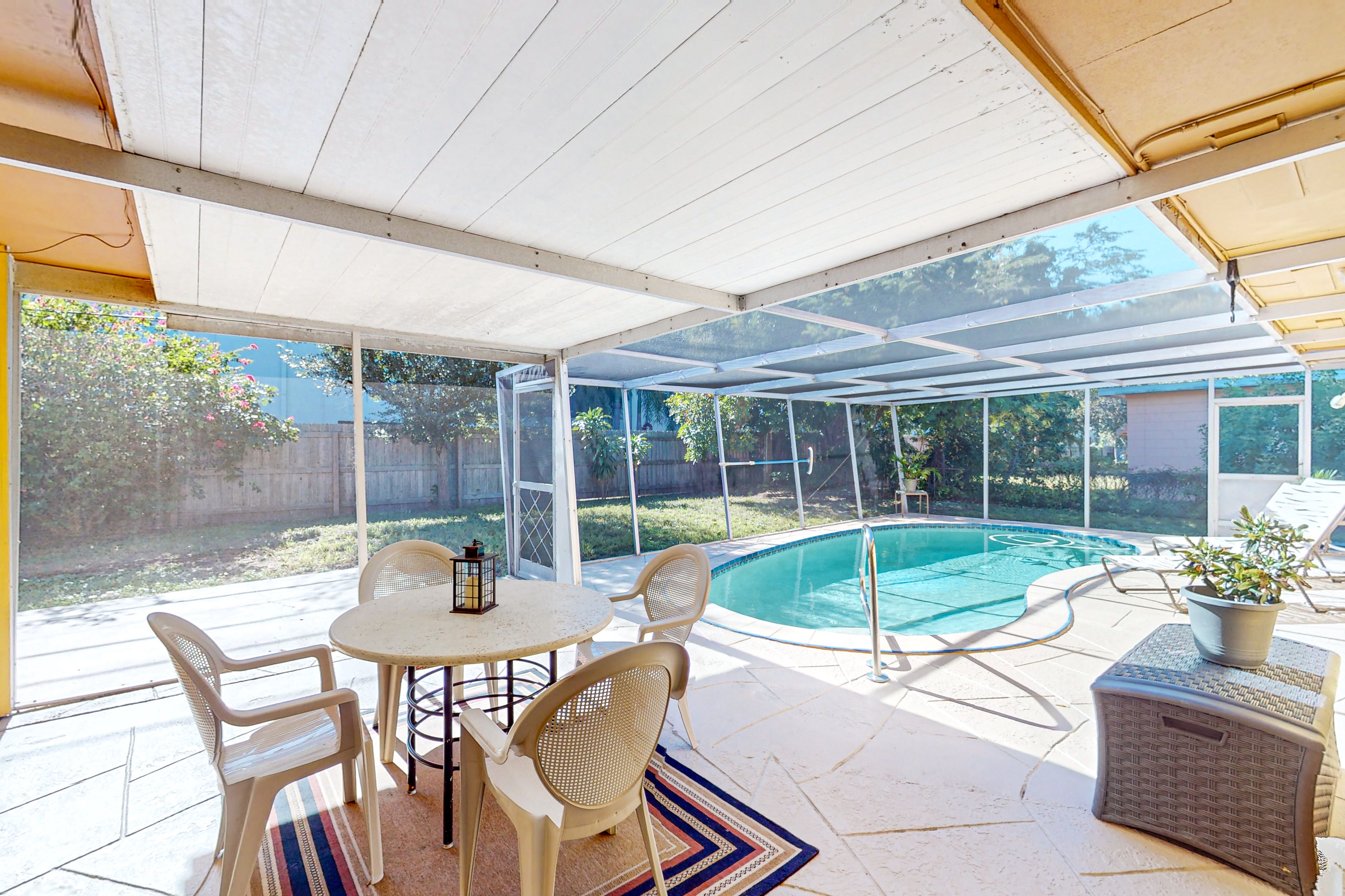 Single story home near beach with heated private pool enclosed yard Dogs ok