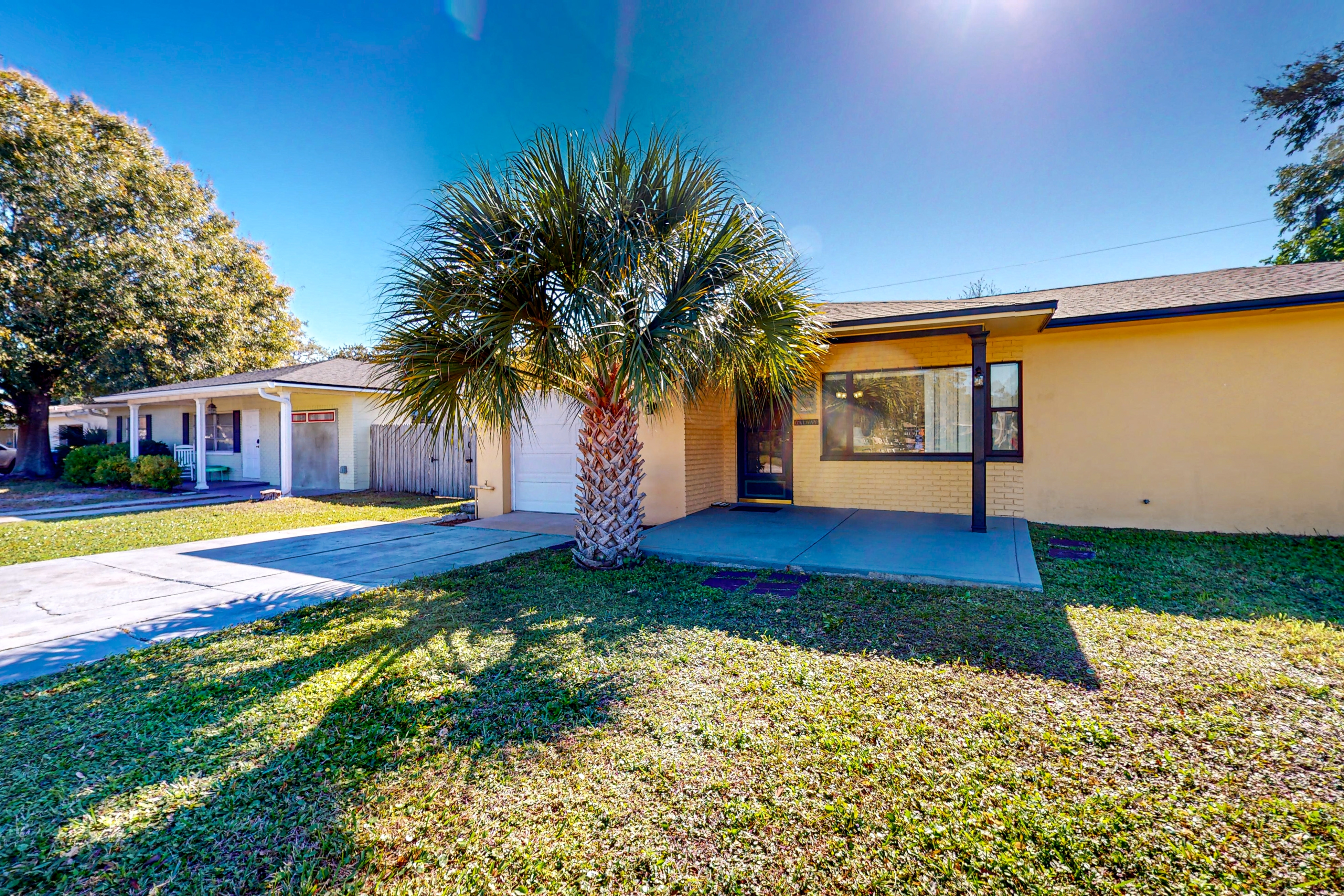 Single story home near beach with heated private pool enclosed yard Dogs ok