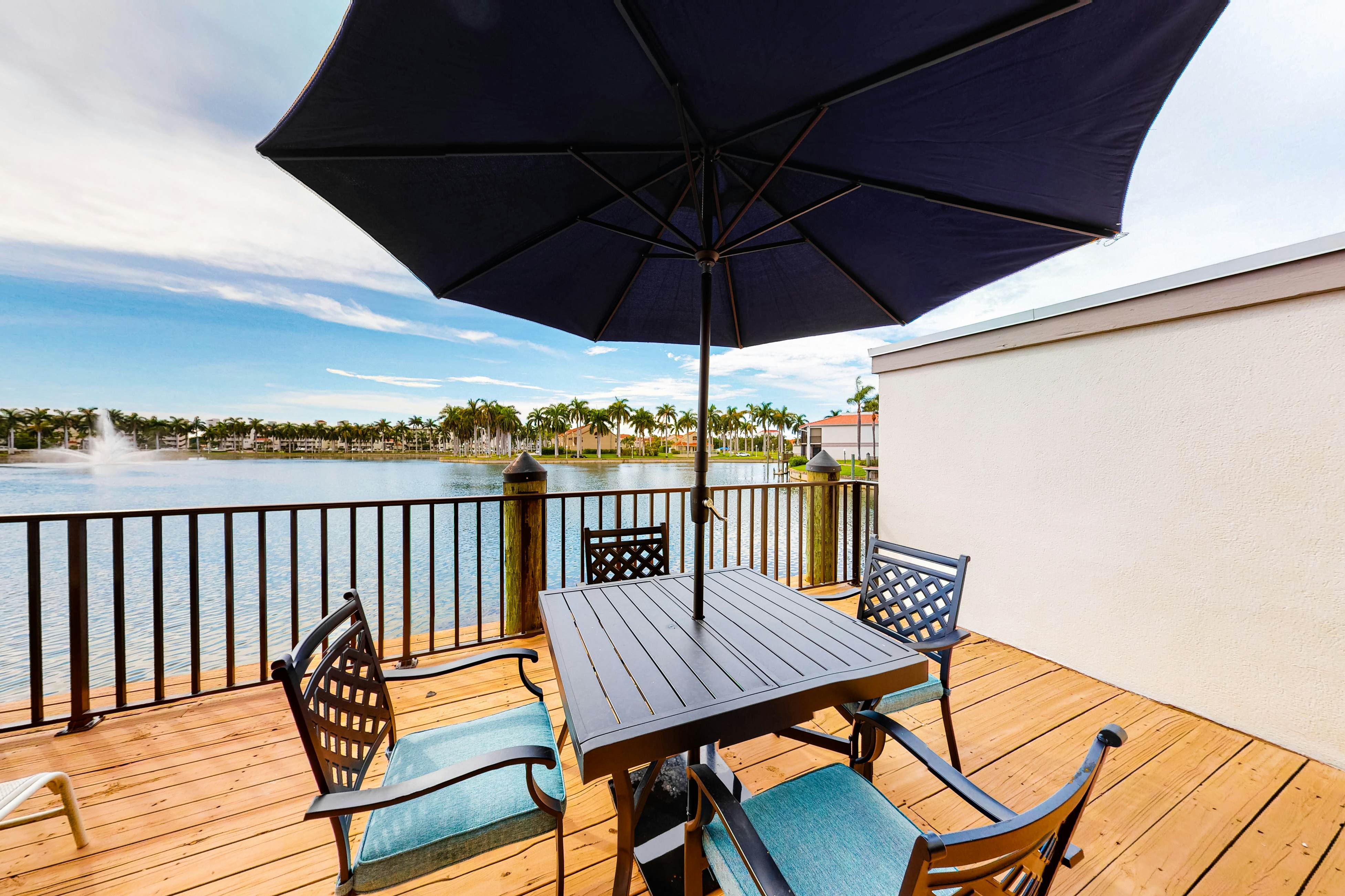 Lakefront resort condo with furnished deck, heated pool, pool spa, & tennis
