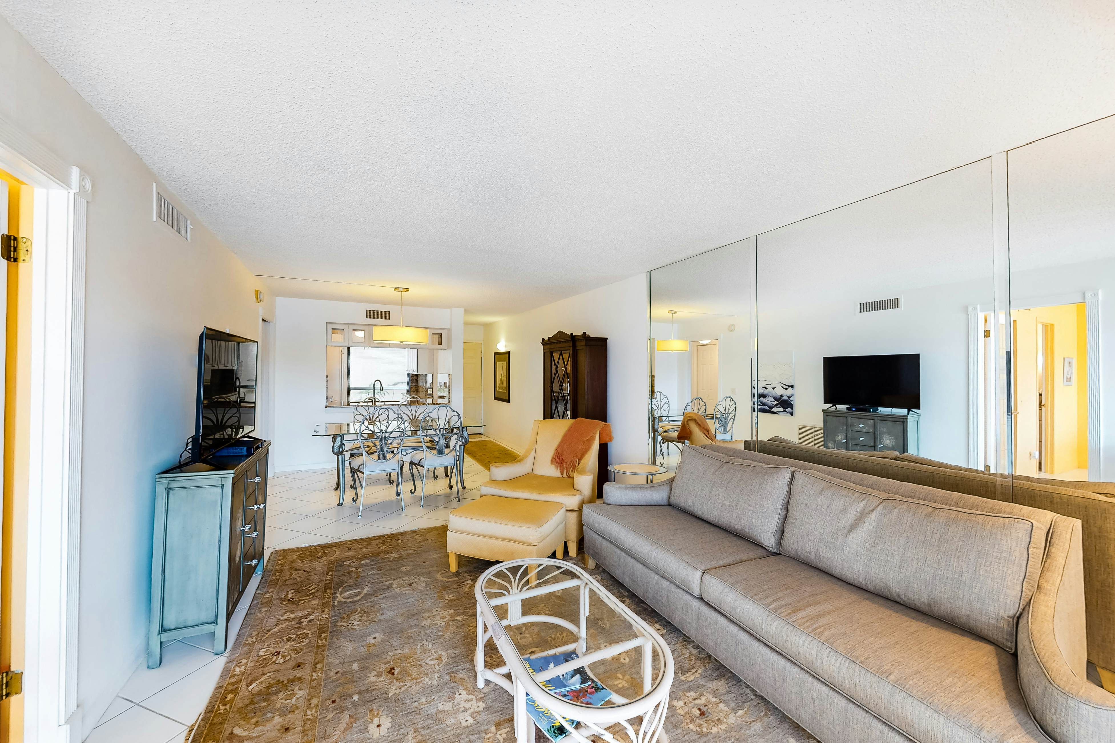 Lakefront resort condo with furnished deck, heated pool, pool spa, & tennis