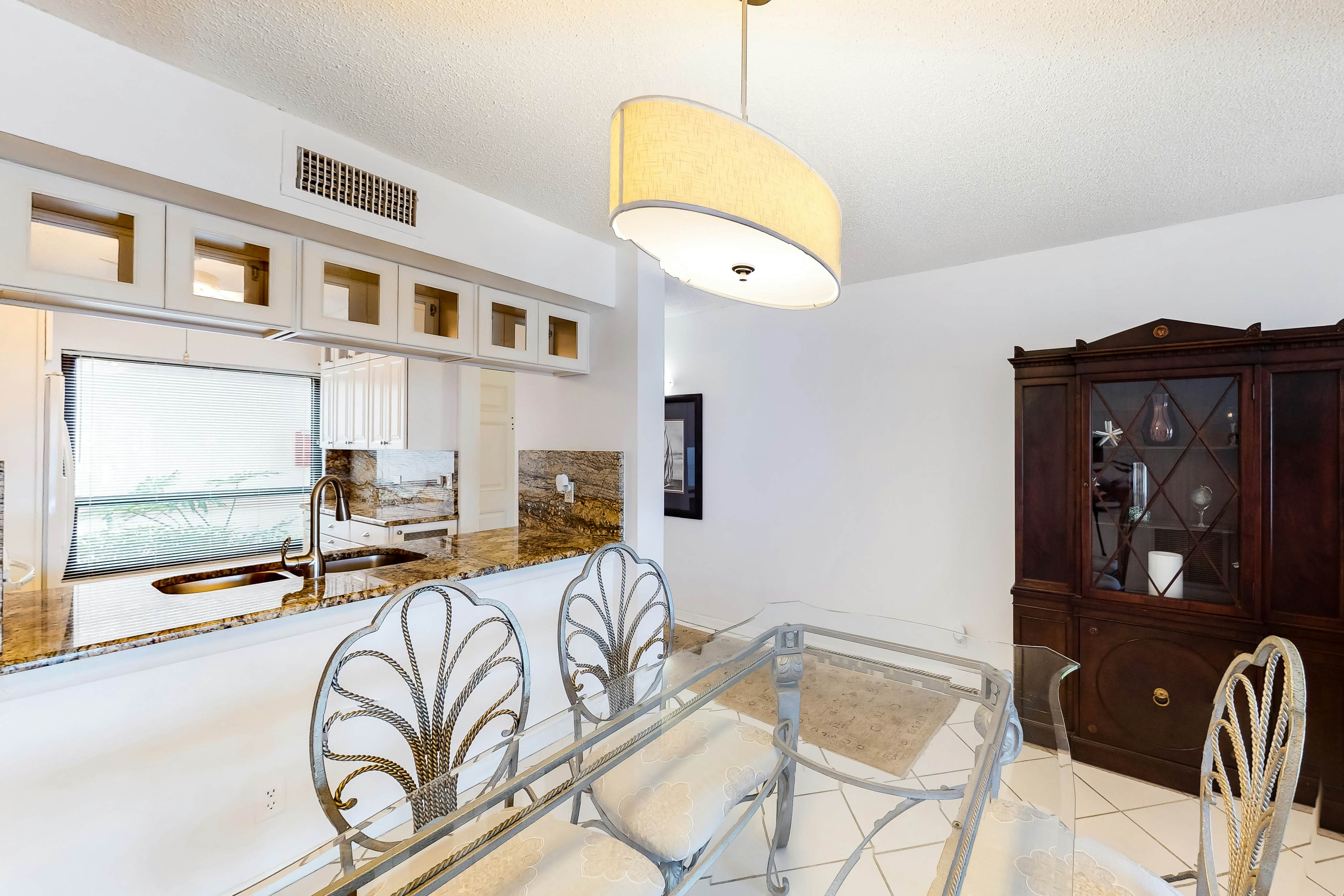 Lakefront resort condo with furnished deck, heated pool, pool spa, & tennis