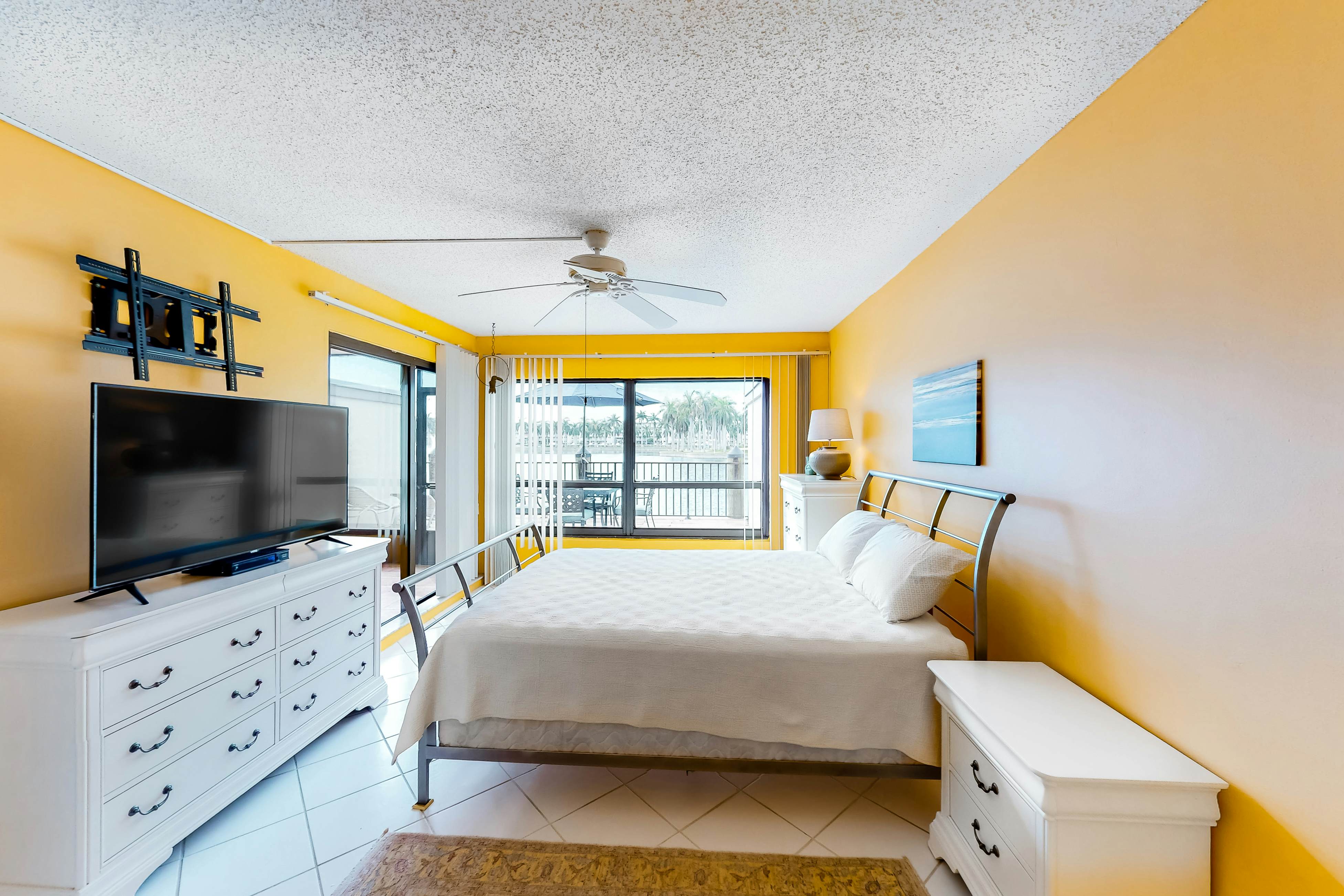 Lakefront resort condo with furnished deck, heated pool, pool spa, & tennis