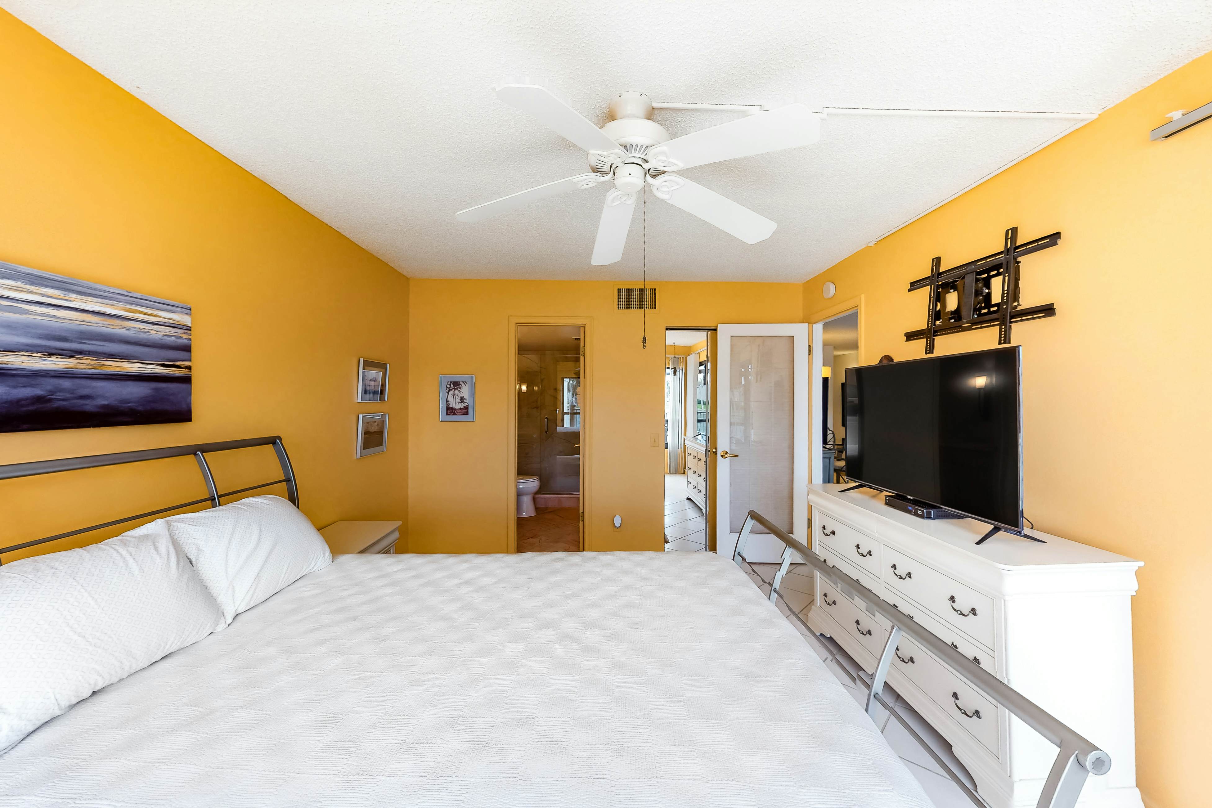 Lakefront resort condo with furnished deck, heated pool, pool spa, & tennis