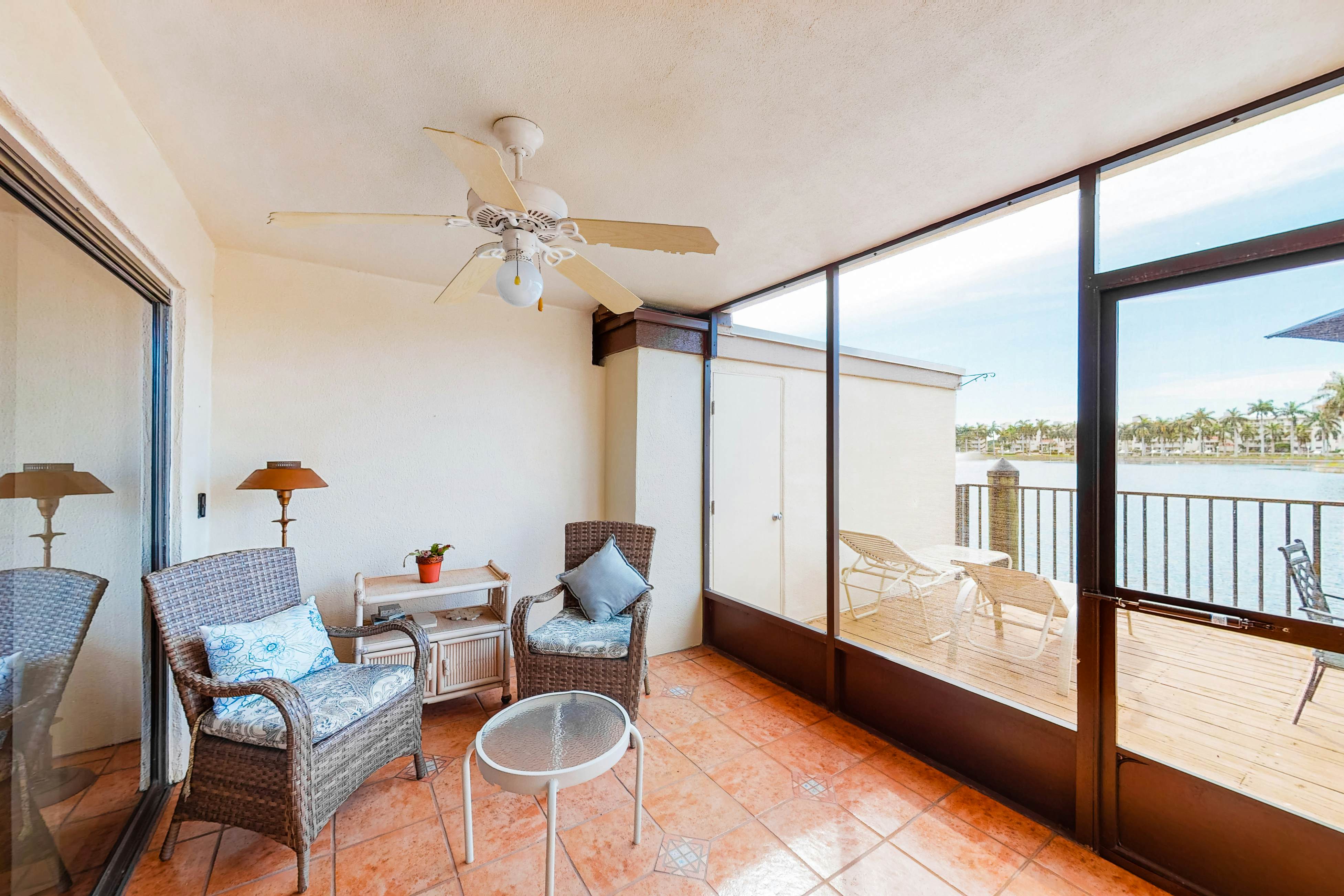 Lakefront resort condo with furnished deck, heated pool, pool spa, & tennis