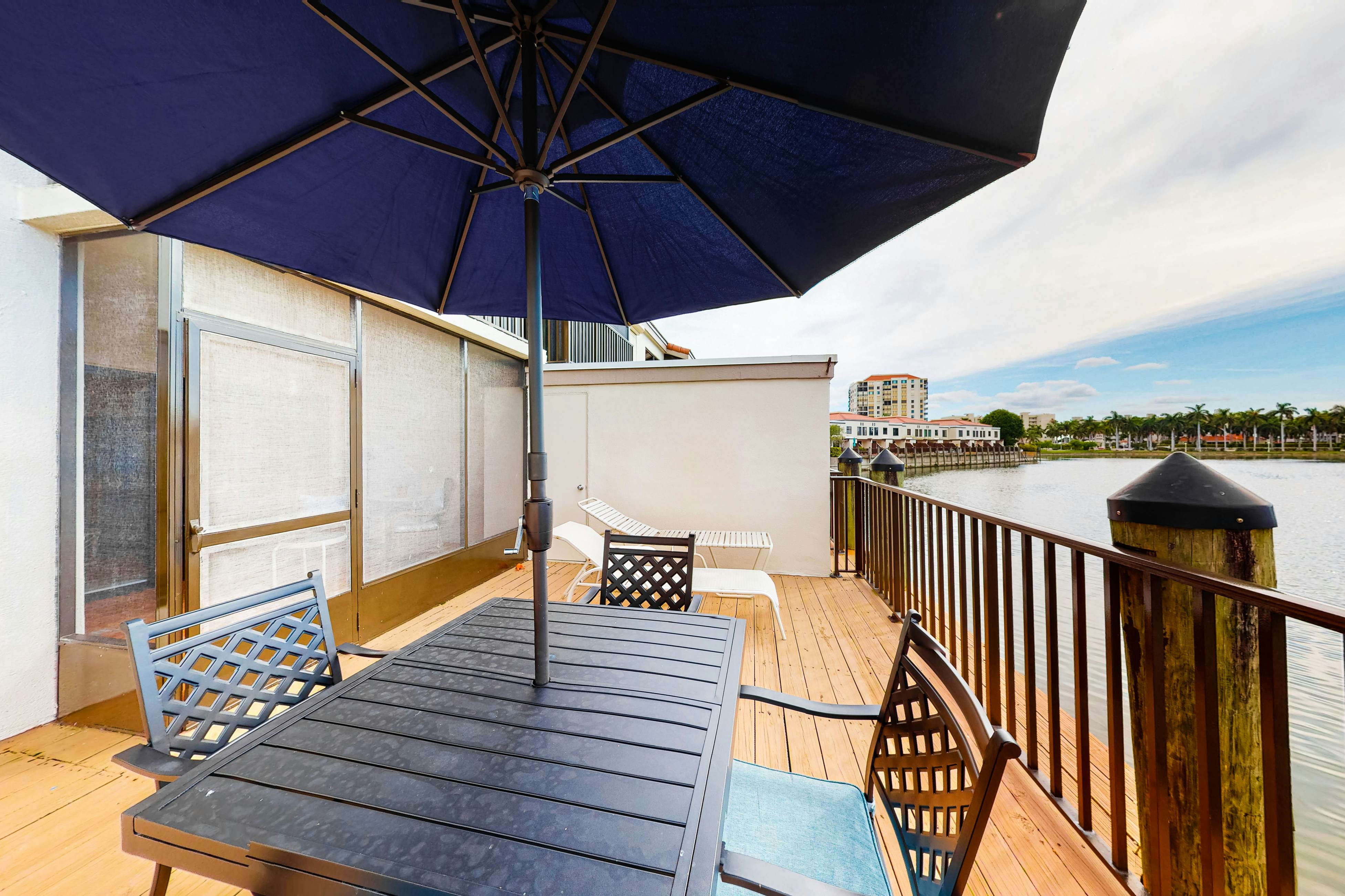 Lakefront resort condo with furnished deck, heated pool, pool spa, & tennis