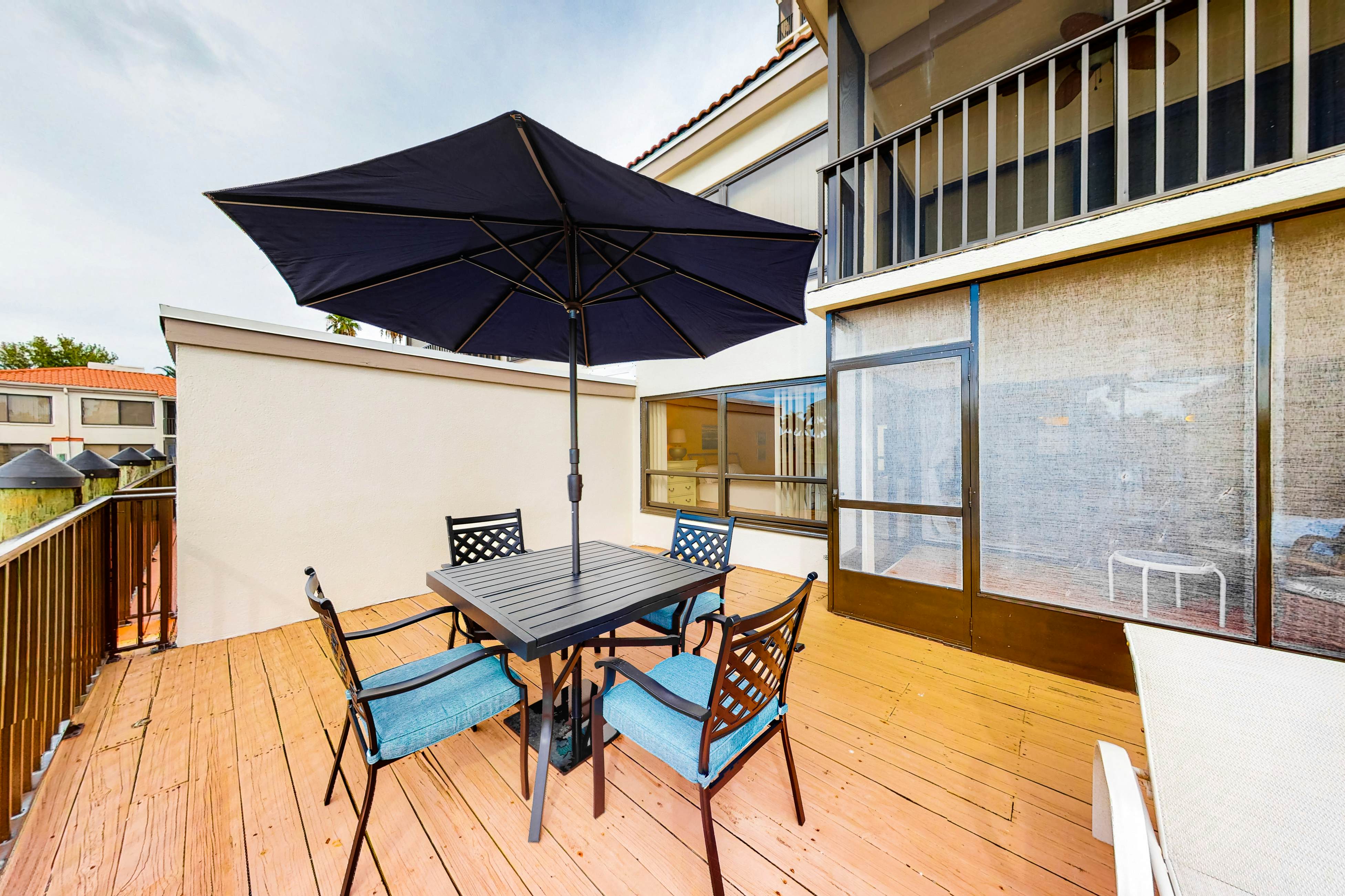 Lakefront resort condo with furnished deck, heated pool, pool spa, & tennis