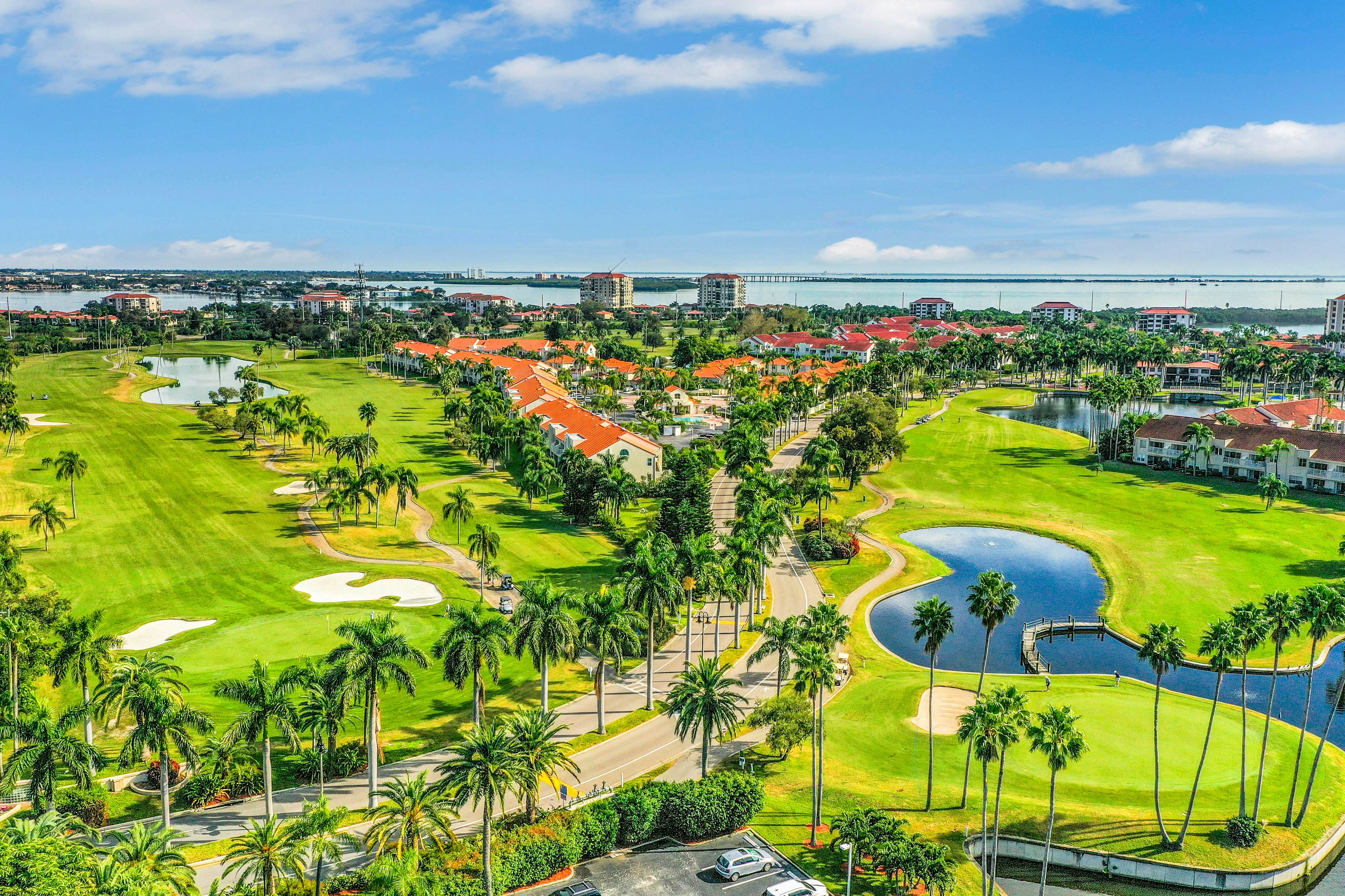 Lakefront resort condo with furnished deck, heated pool, pool spa, & tennis