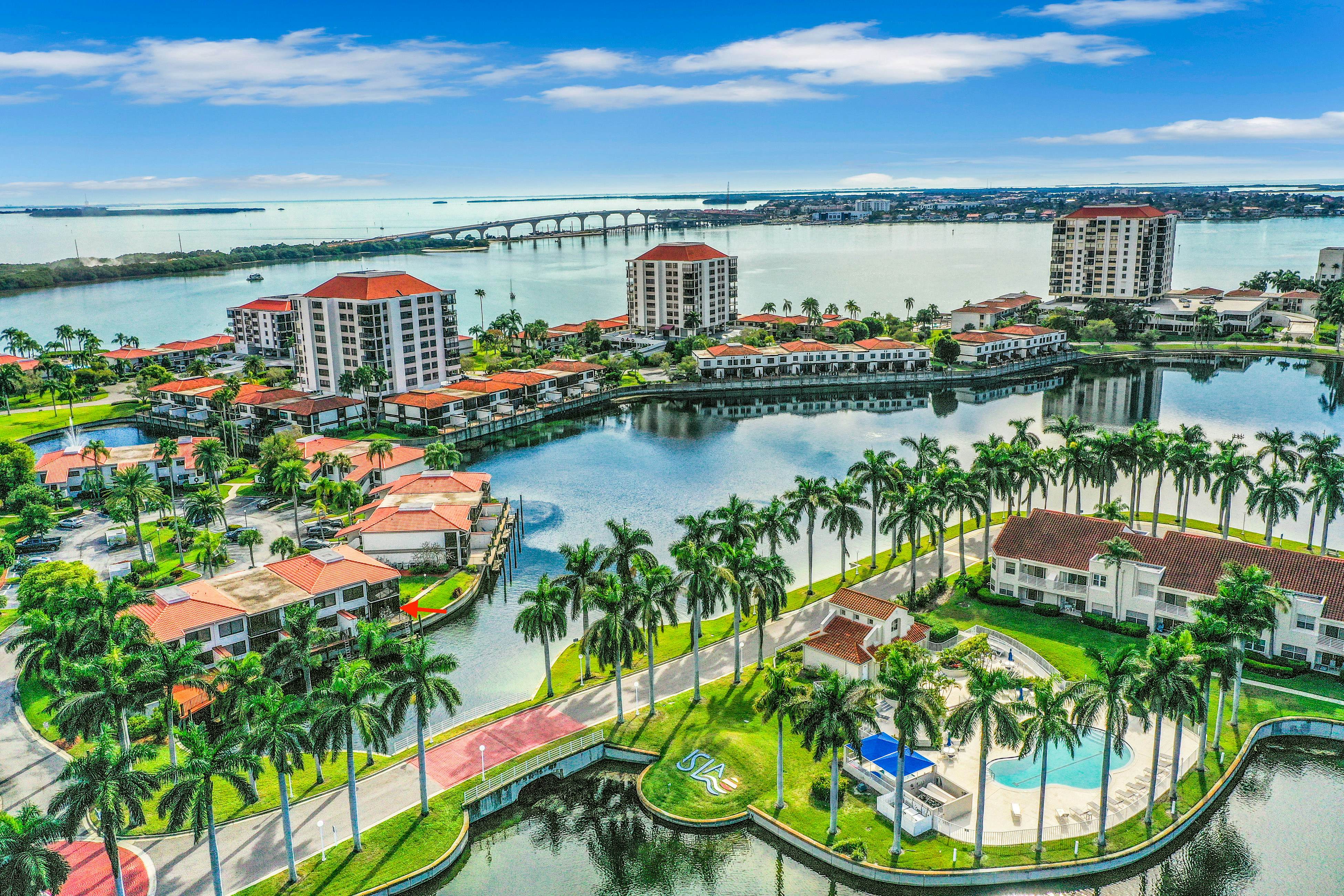 Lakefront resort condo with furnished deck, heated pool, pool spa, & tennis