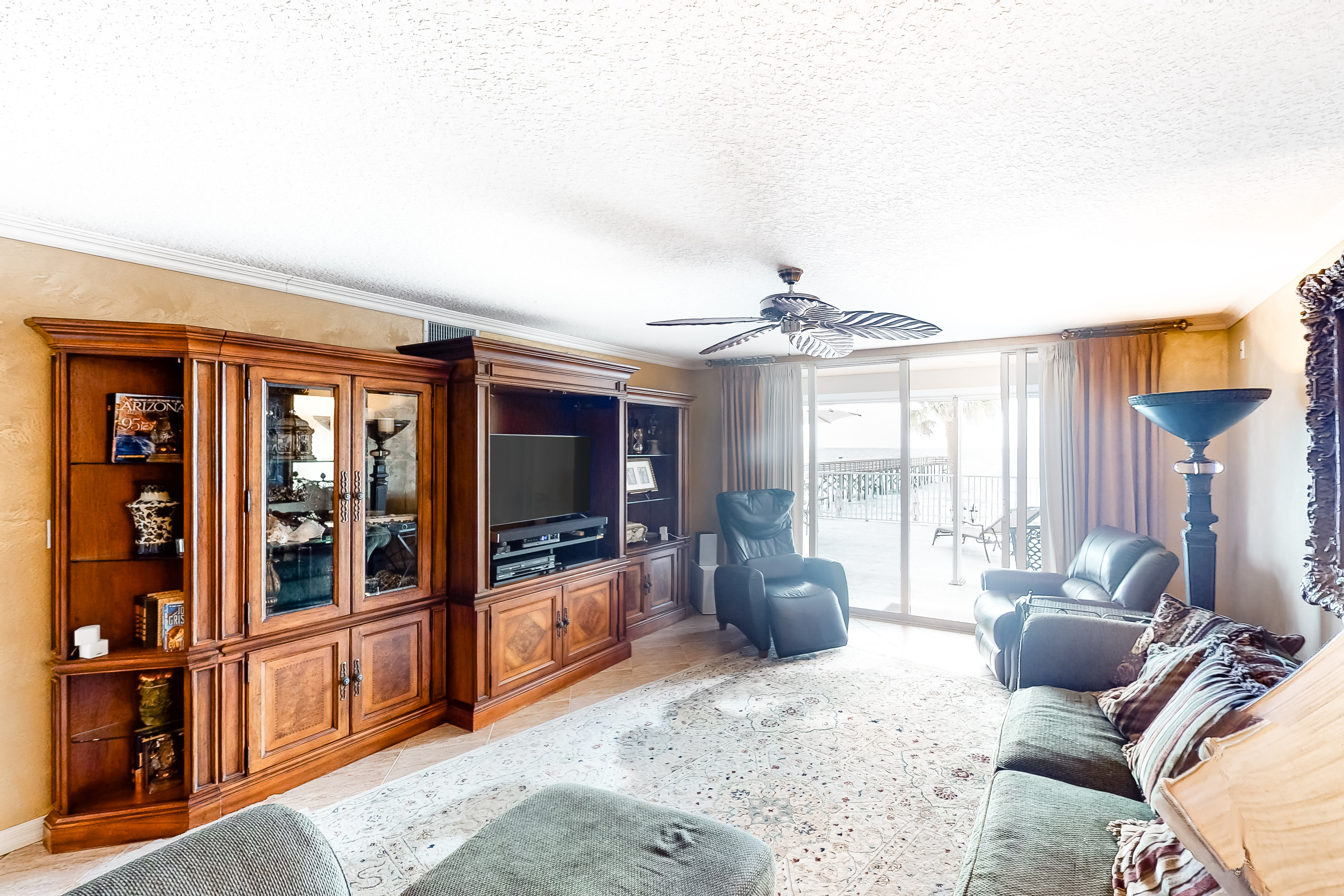 Beachfront condo w Gulf views balcony washer dryer central A C shared pools