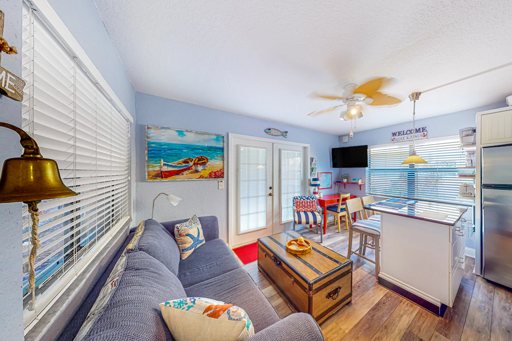 First floor condo with courtyard style pool grills and easy beach access