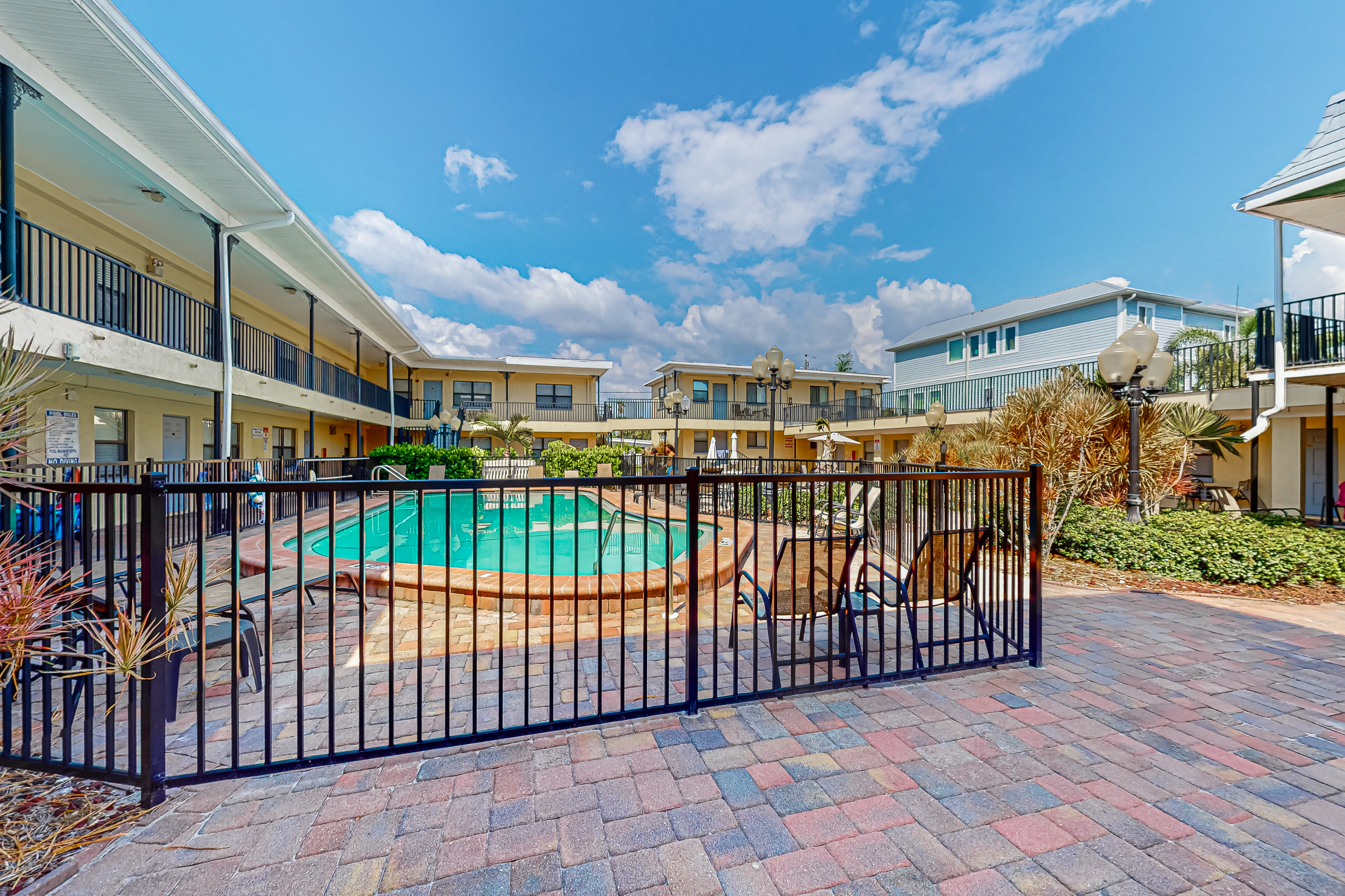 First floor condo with courtyard style pool grills and easy beach access