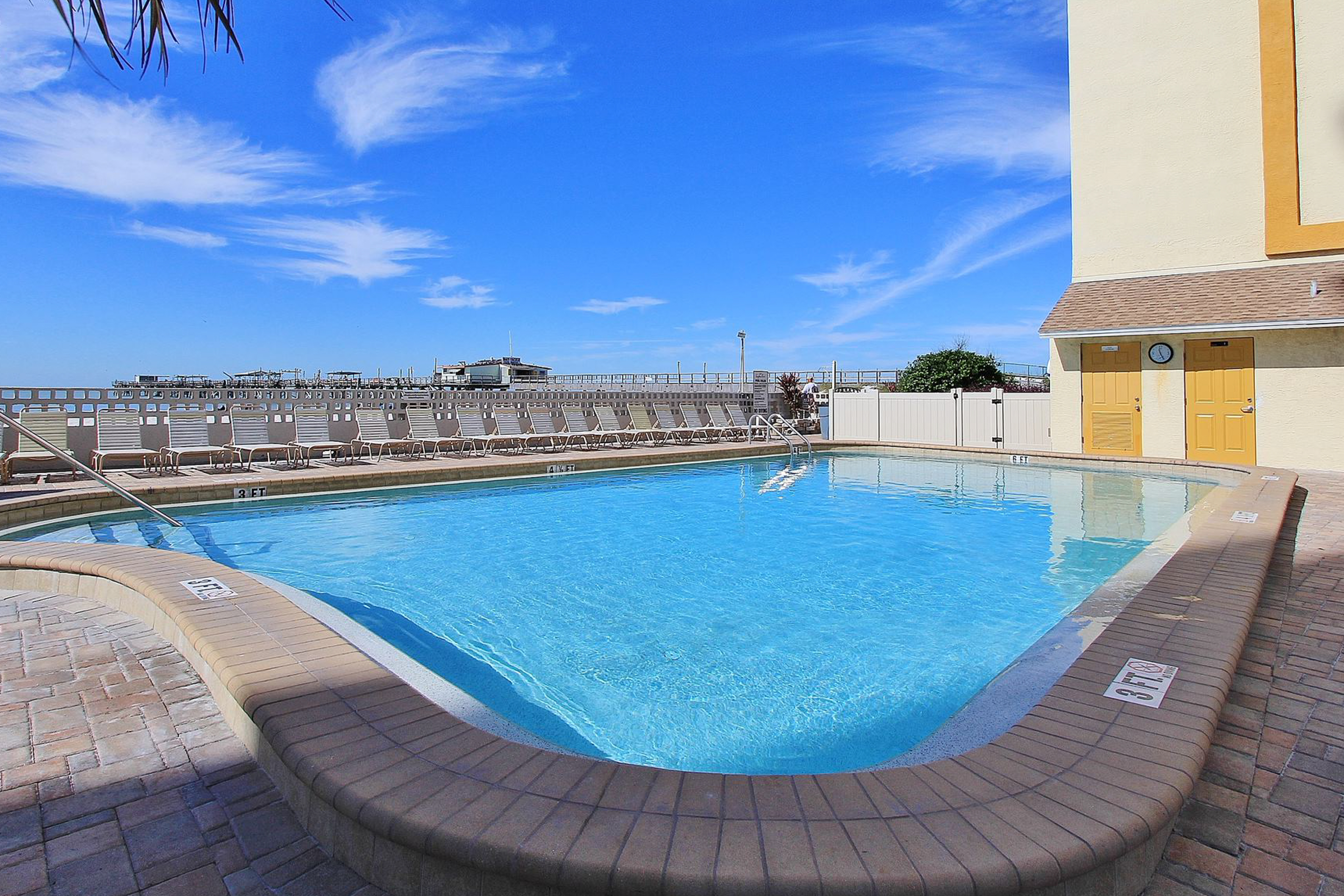 Custom beachfront condo w private balcony views heated pool hot tub AC