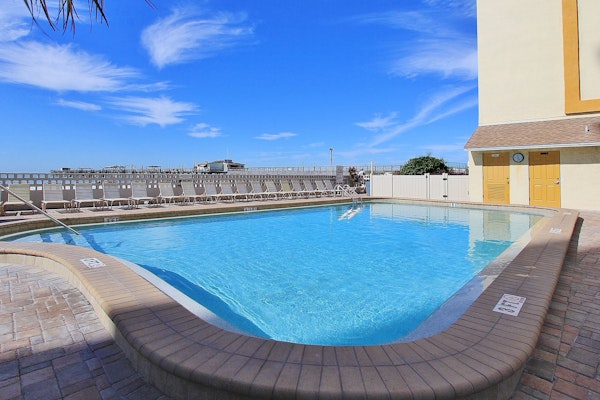 Custom beachfront condo w private balcony views heated pool hot tub AC