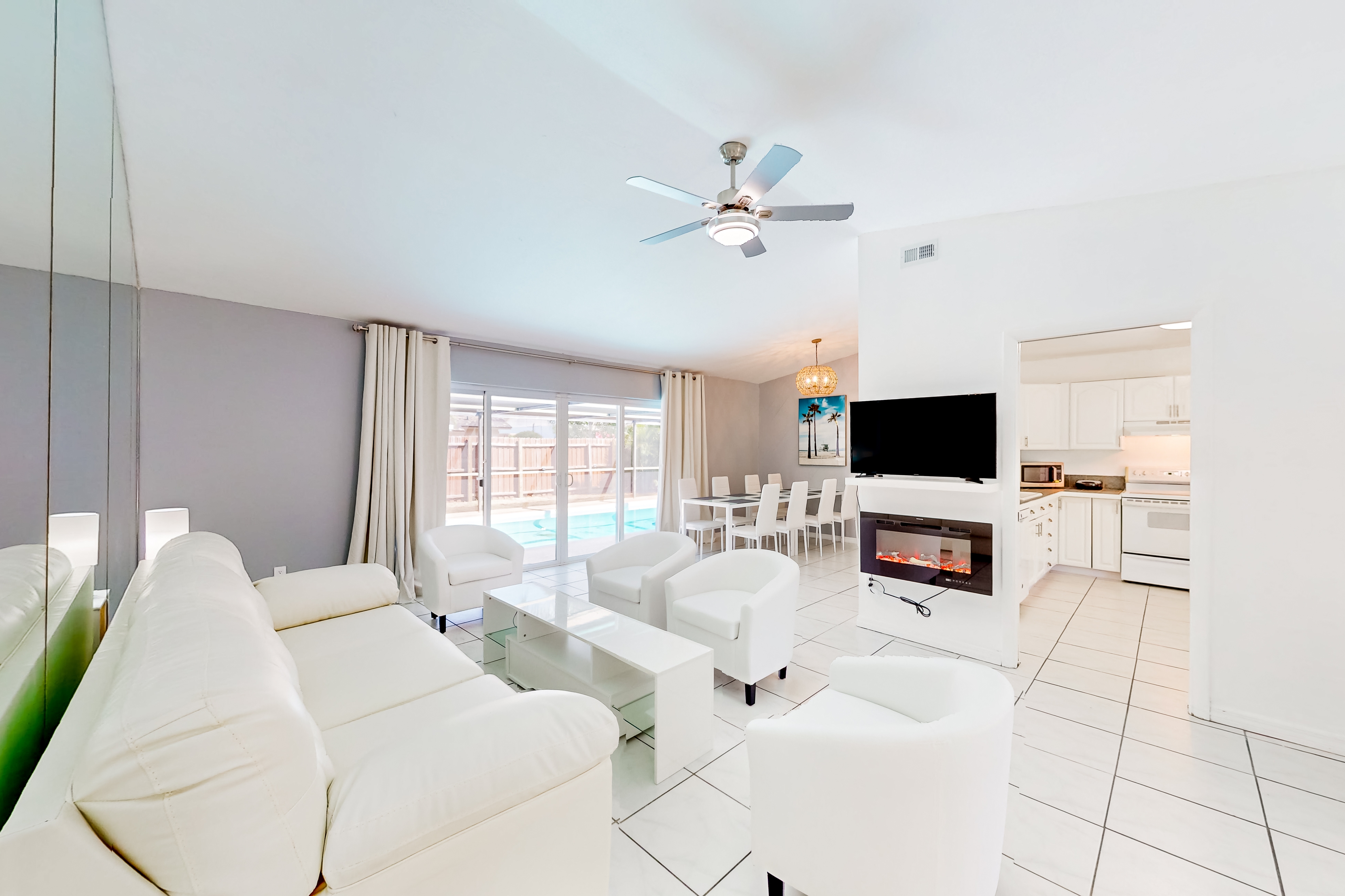 Coastal home with pool lanai patio and fireplace