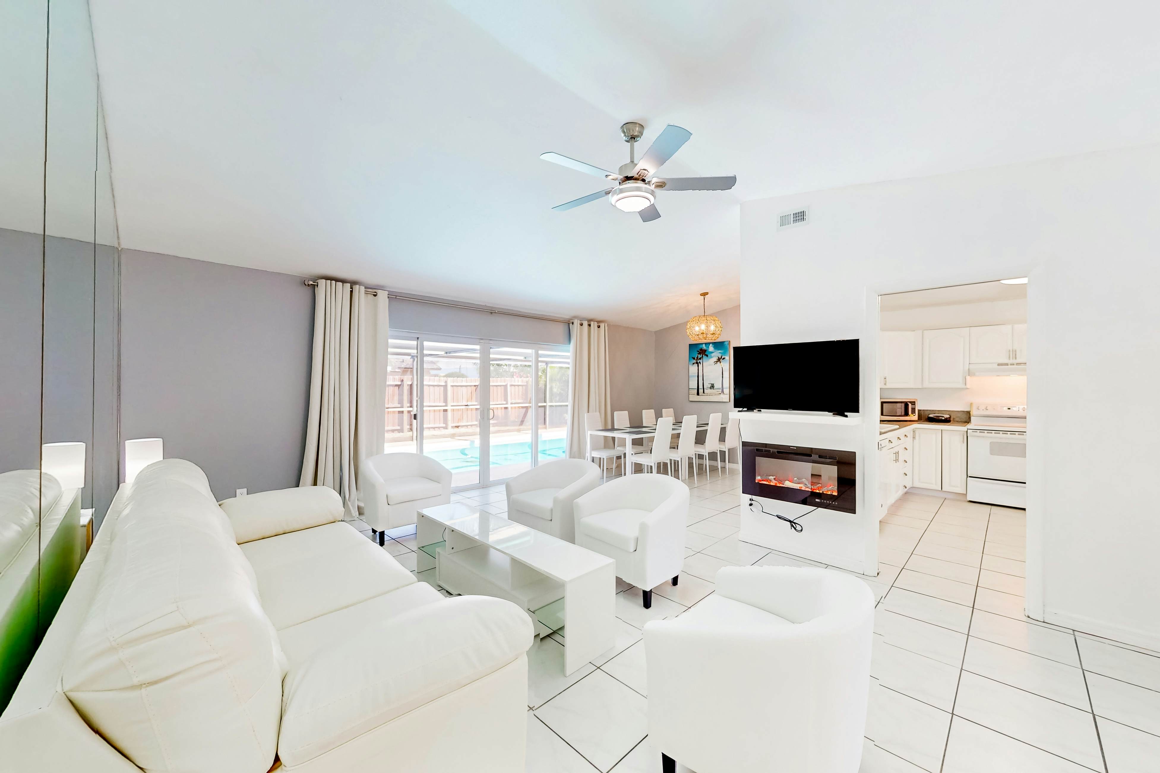 Coastal home with pool, lanai, patio, & fireplace