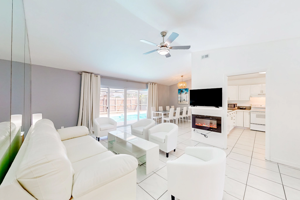 Coastal home with pool lanai patio and fireplace