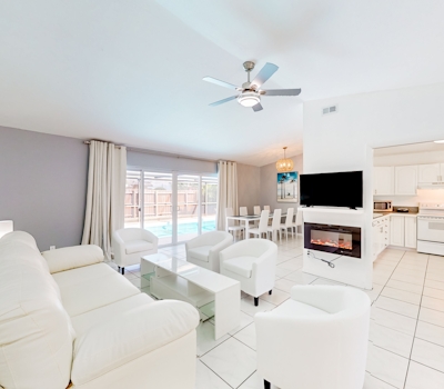 Coastal home with pool lanai patio and fireplace