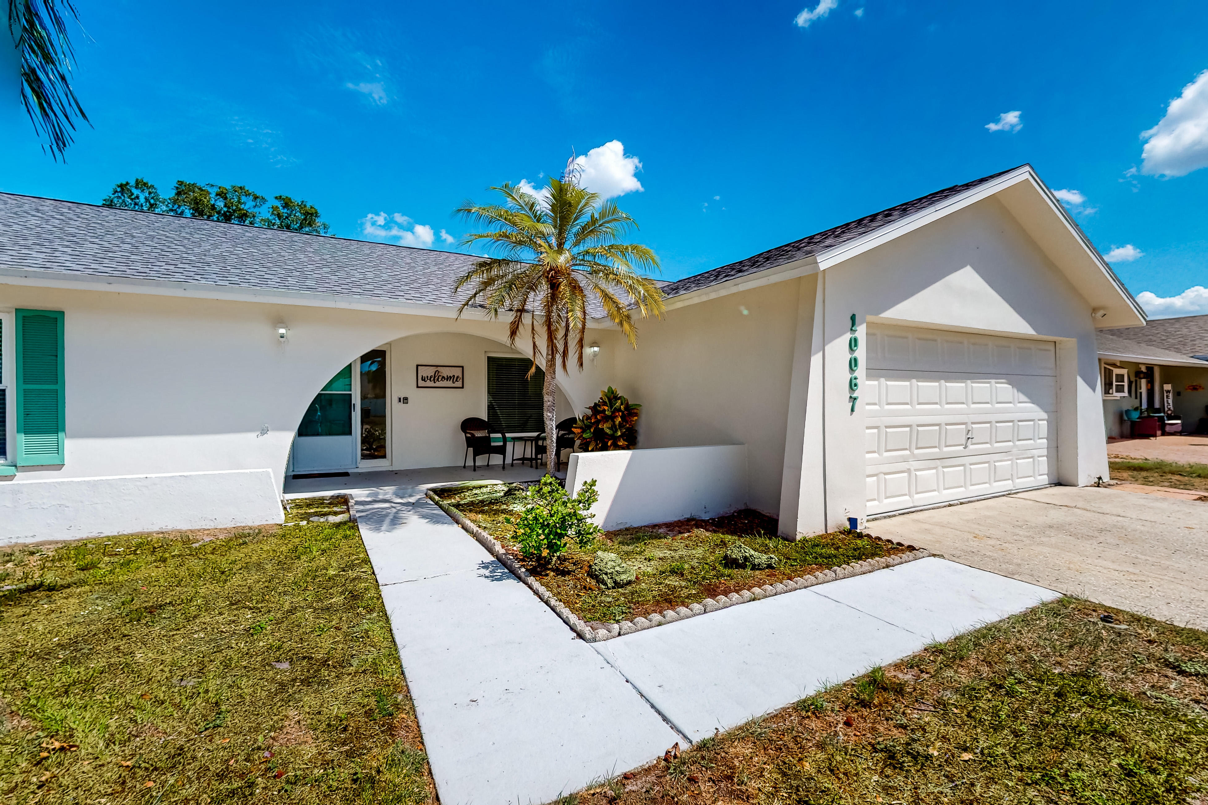 Coastal home with pool lanai patio and fireplace