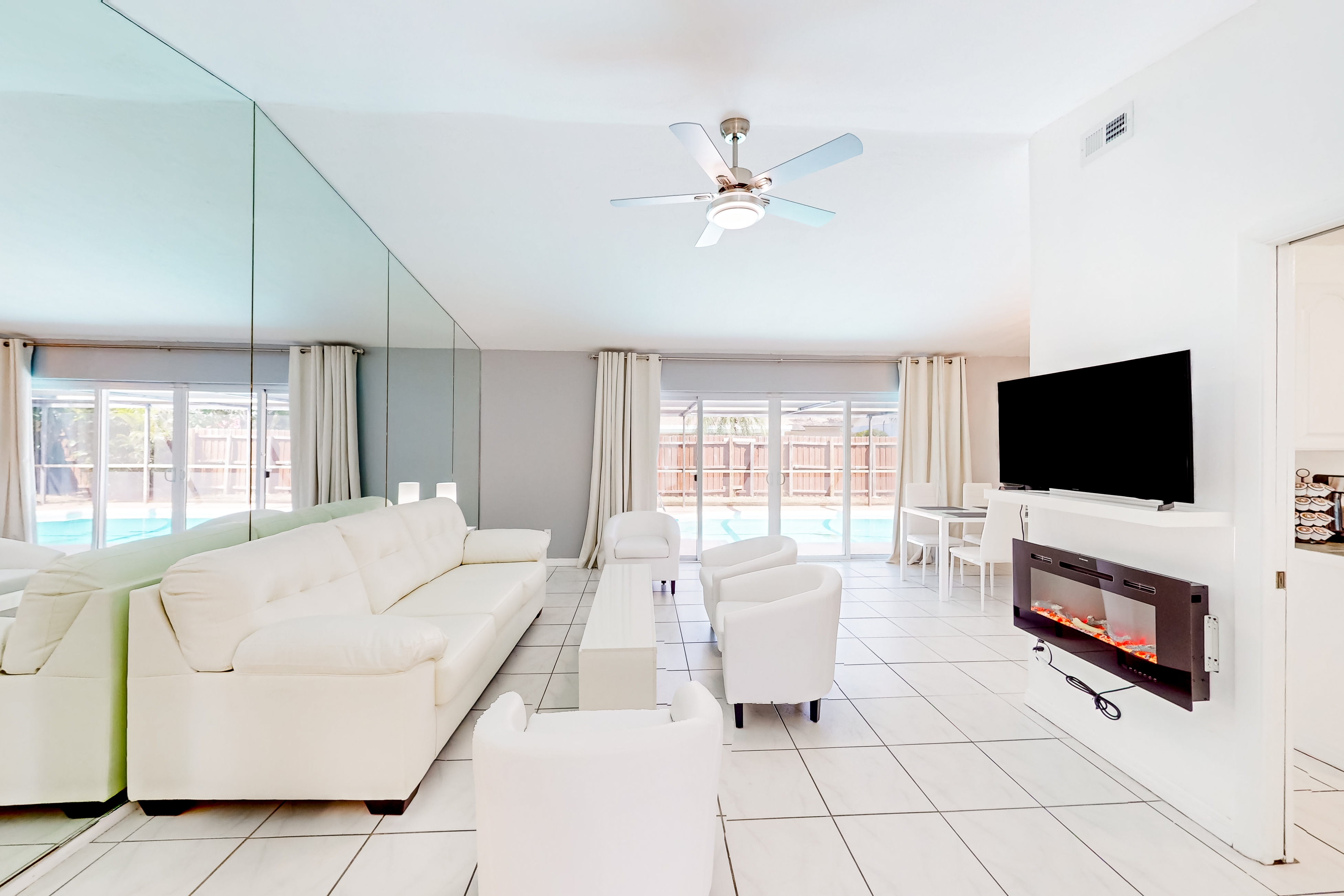 Coastal home with pool lanai patio and fireplace