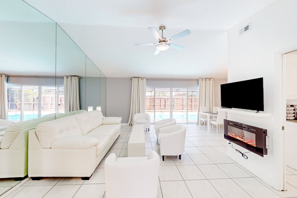 Coastal home with pool lanai patio and fireplace