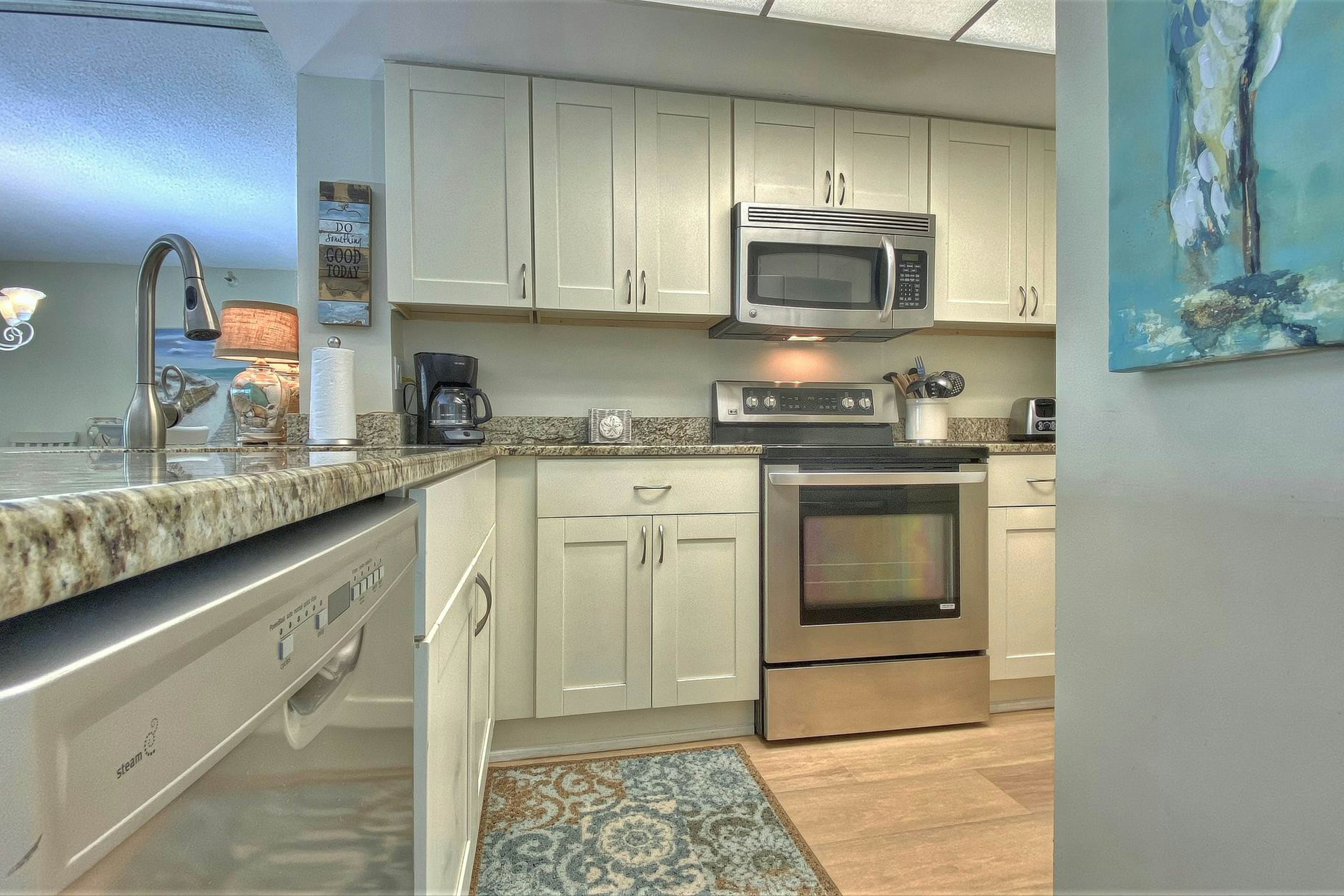 Peaceful beachfront escape w/private balcony, heated pool, pool spa, BBQ grills