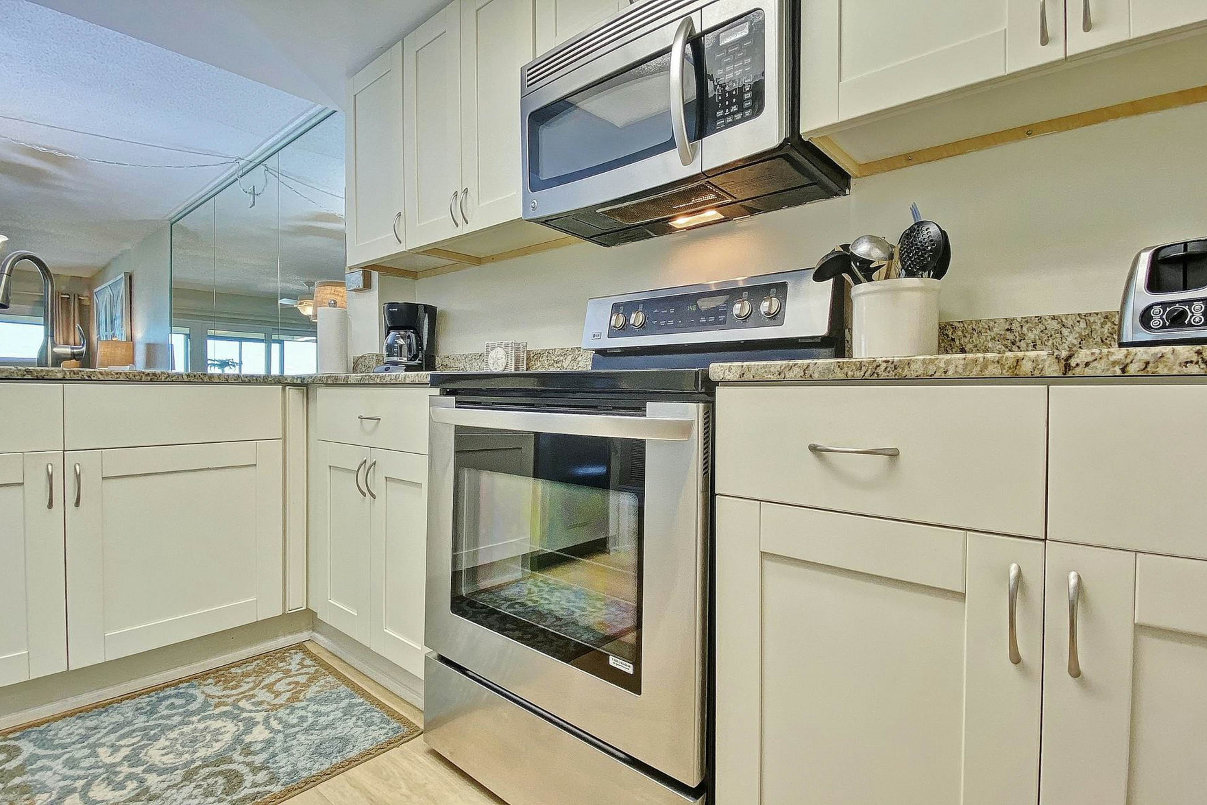 Peaceful beachfront escape w/private balcony, heated pool, pool spa, BBQ grills