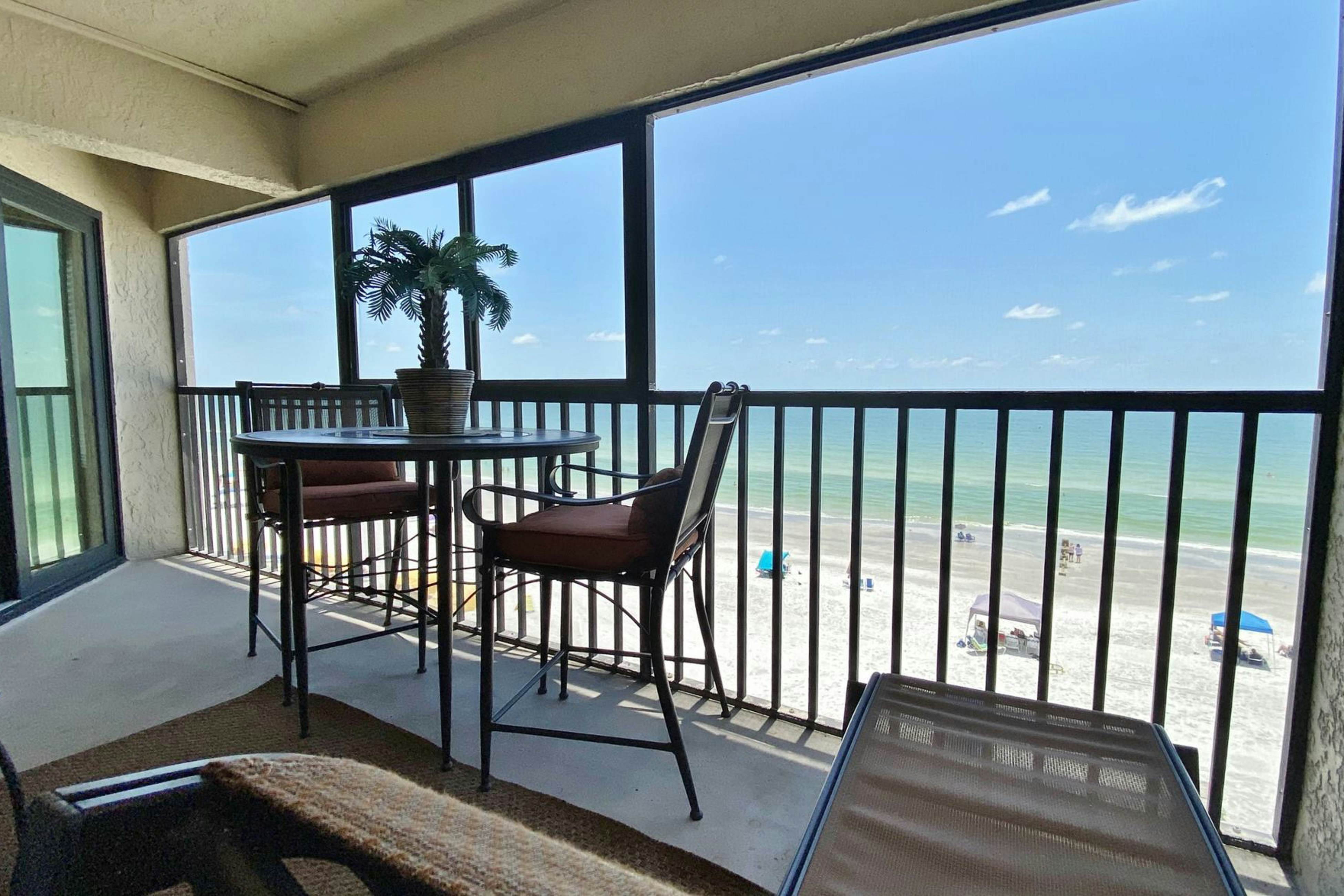 Peaceful beachfront escape w/private balcony, heated pool, pool spa, BBQ grills