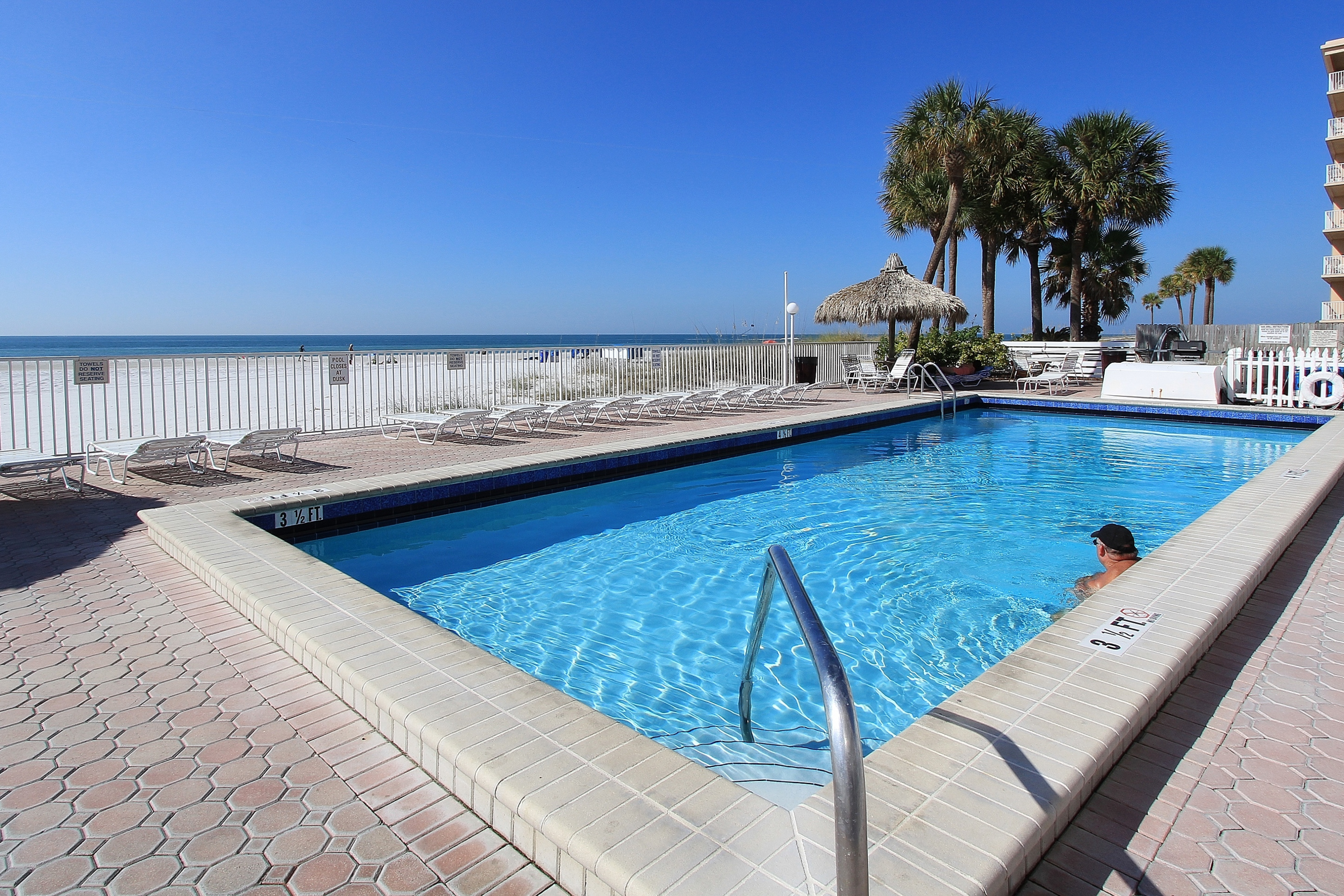 Upscale beachfront condo with dual balconies Gulf view pool hot tub and bocce
