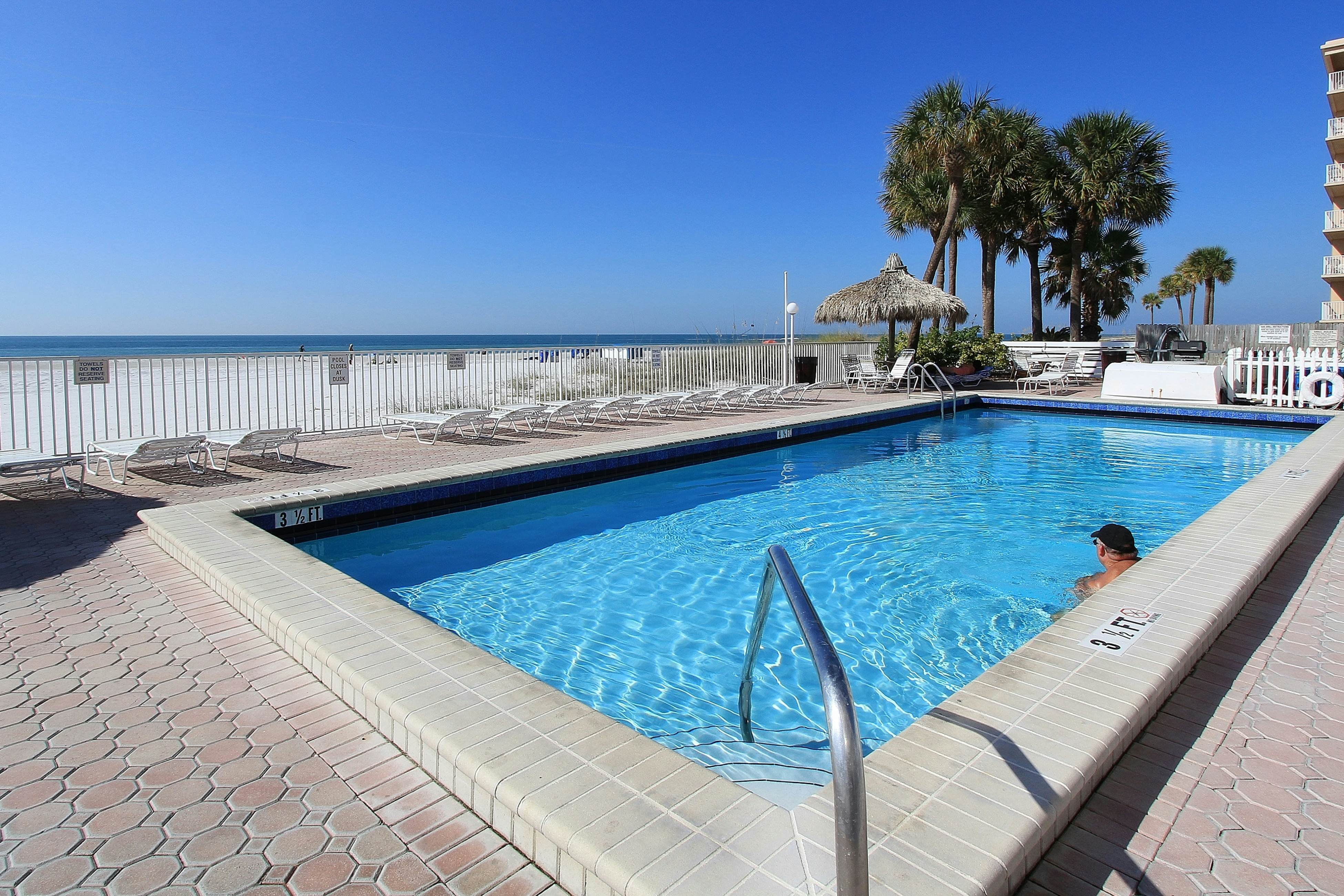 Upscale, beachfront condo with dual balconies, Gulf view, pool, hot tub & bocce