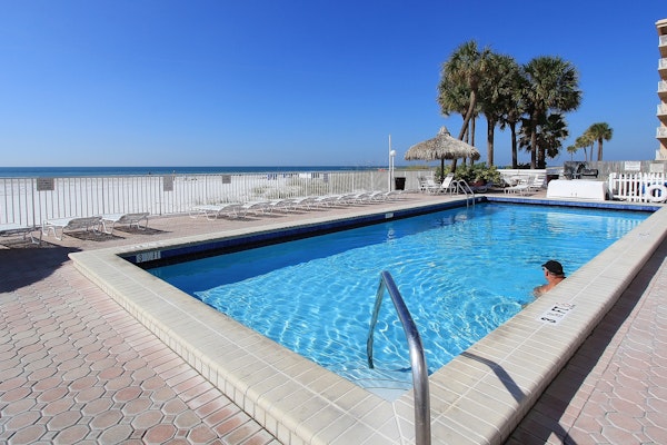 Upscale beachfront condo with dual balconies Gulf view pool hot tub and bocce