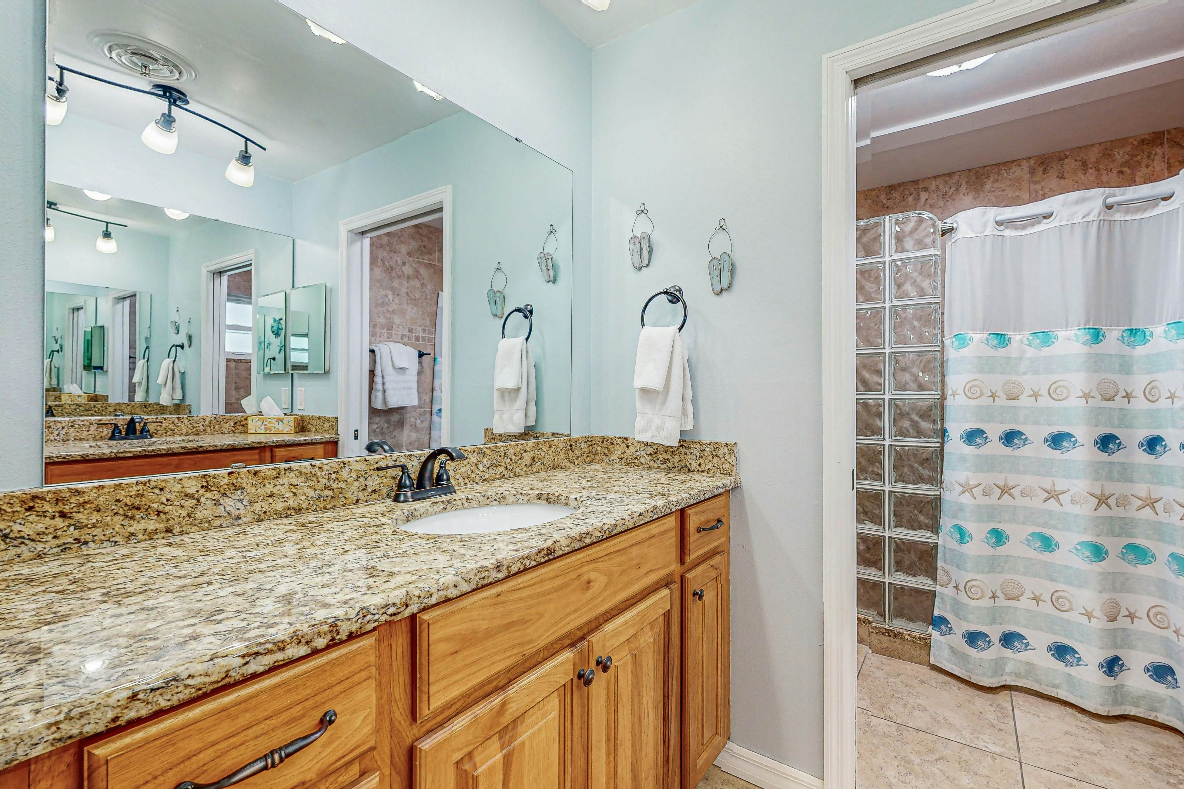 Upscale, beachfront condo with dual balconies, Gulf view, pool, hot tub & bocce