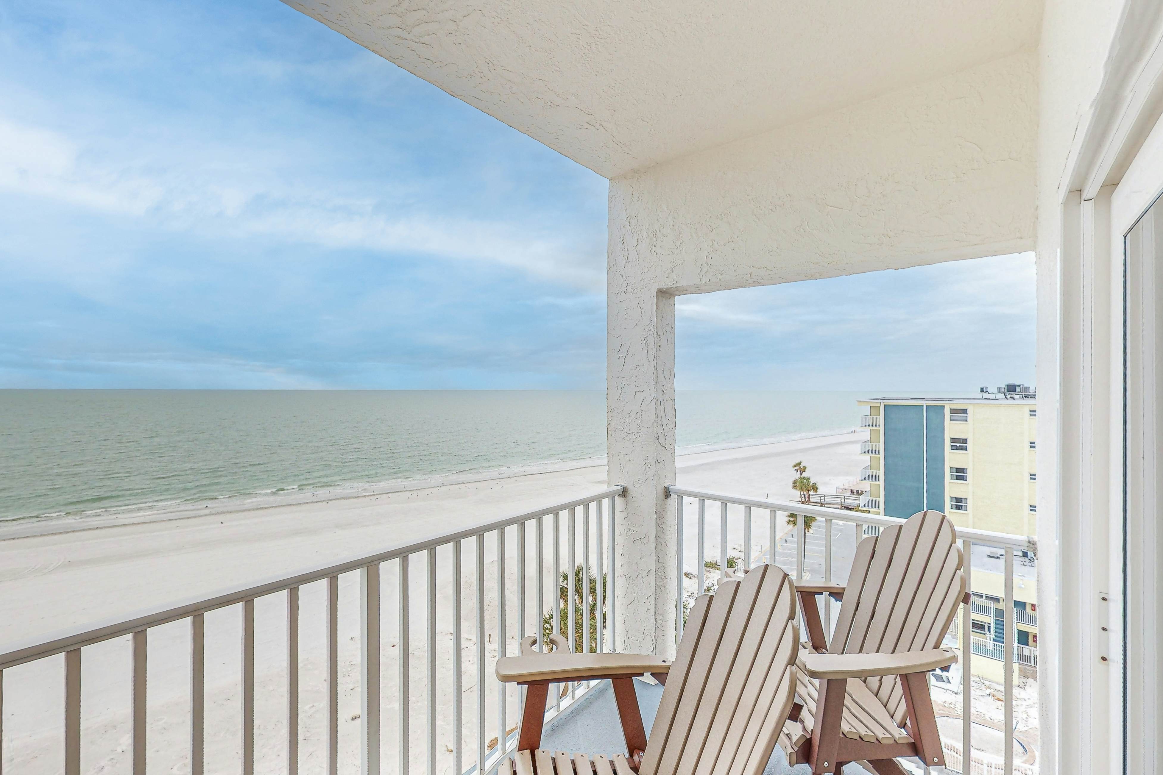 Upscale, beachfront condo with dual balconies, Gulf view, pool, hot tub & bocce