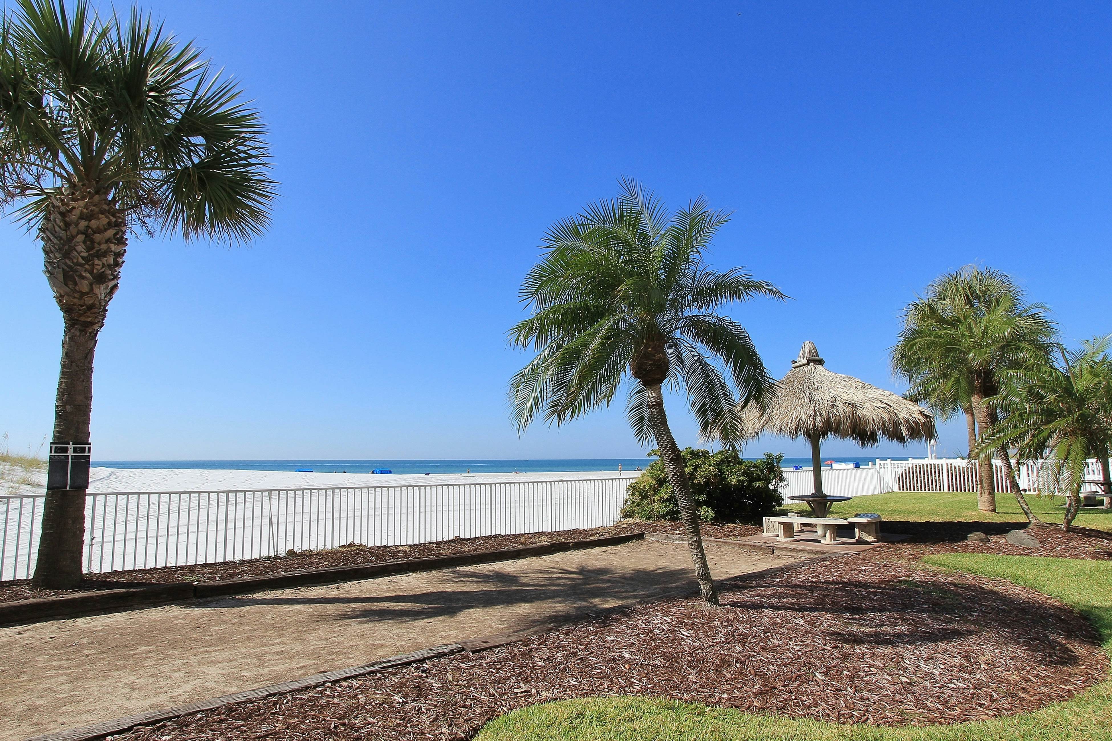 Upscale, beachfront condo with dual balconies, Gulf view, pool, hot tub & bocce